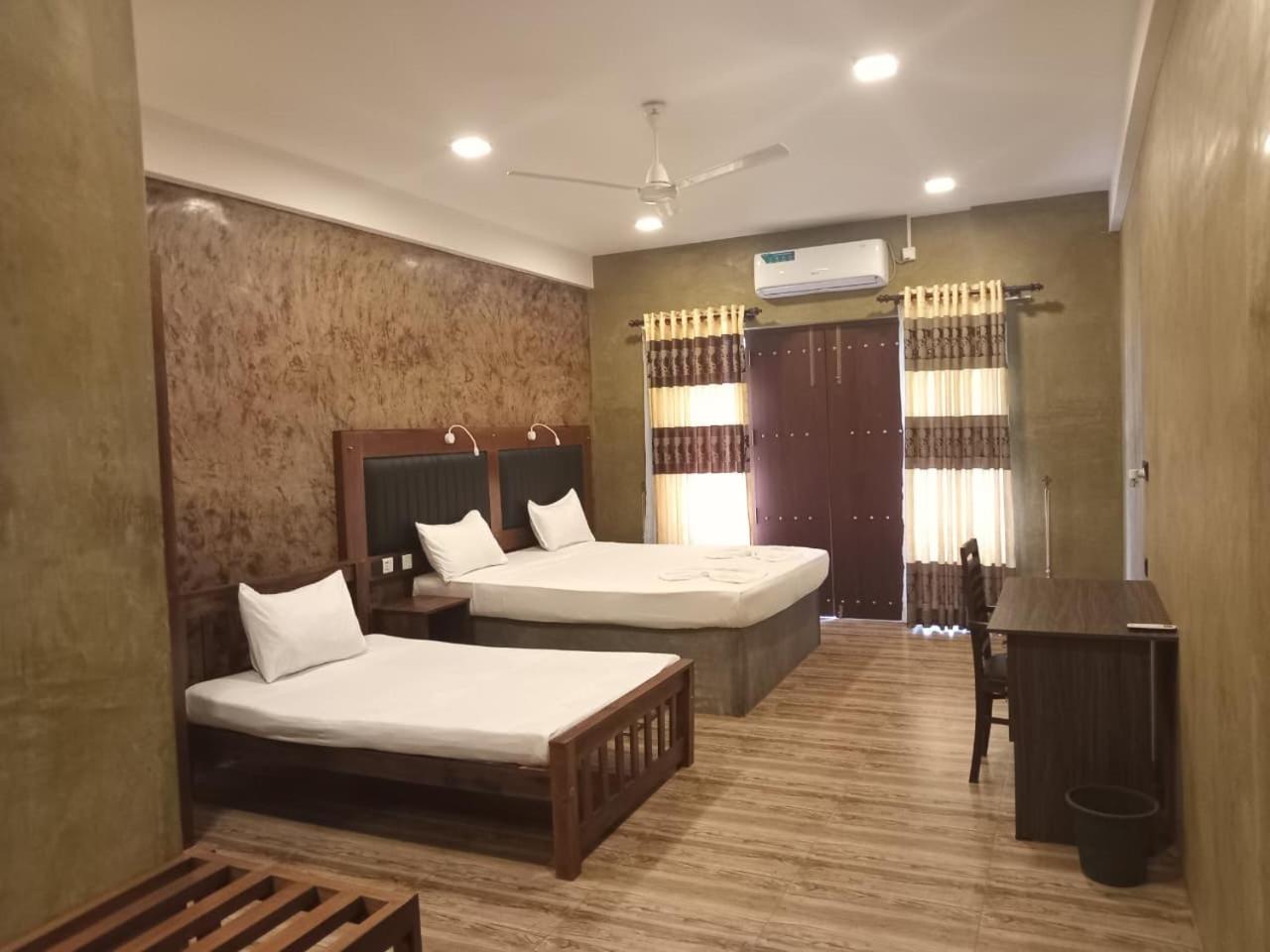 Deluxe Triple Room