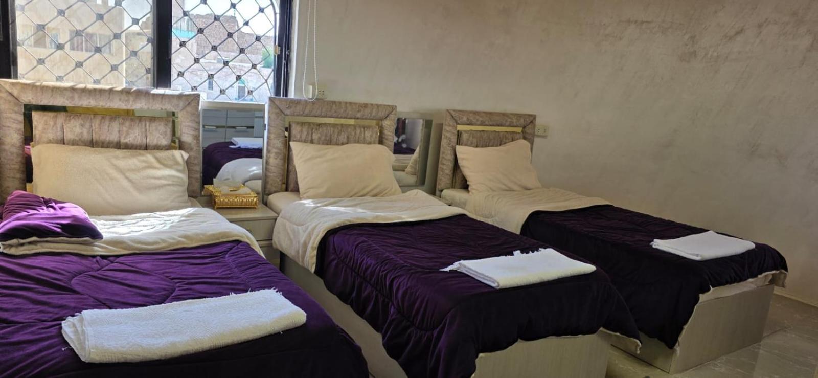 Economy Triple Room photo 2