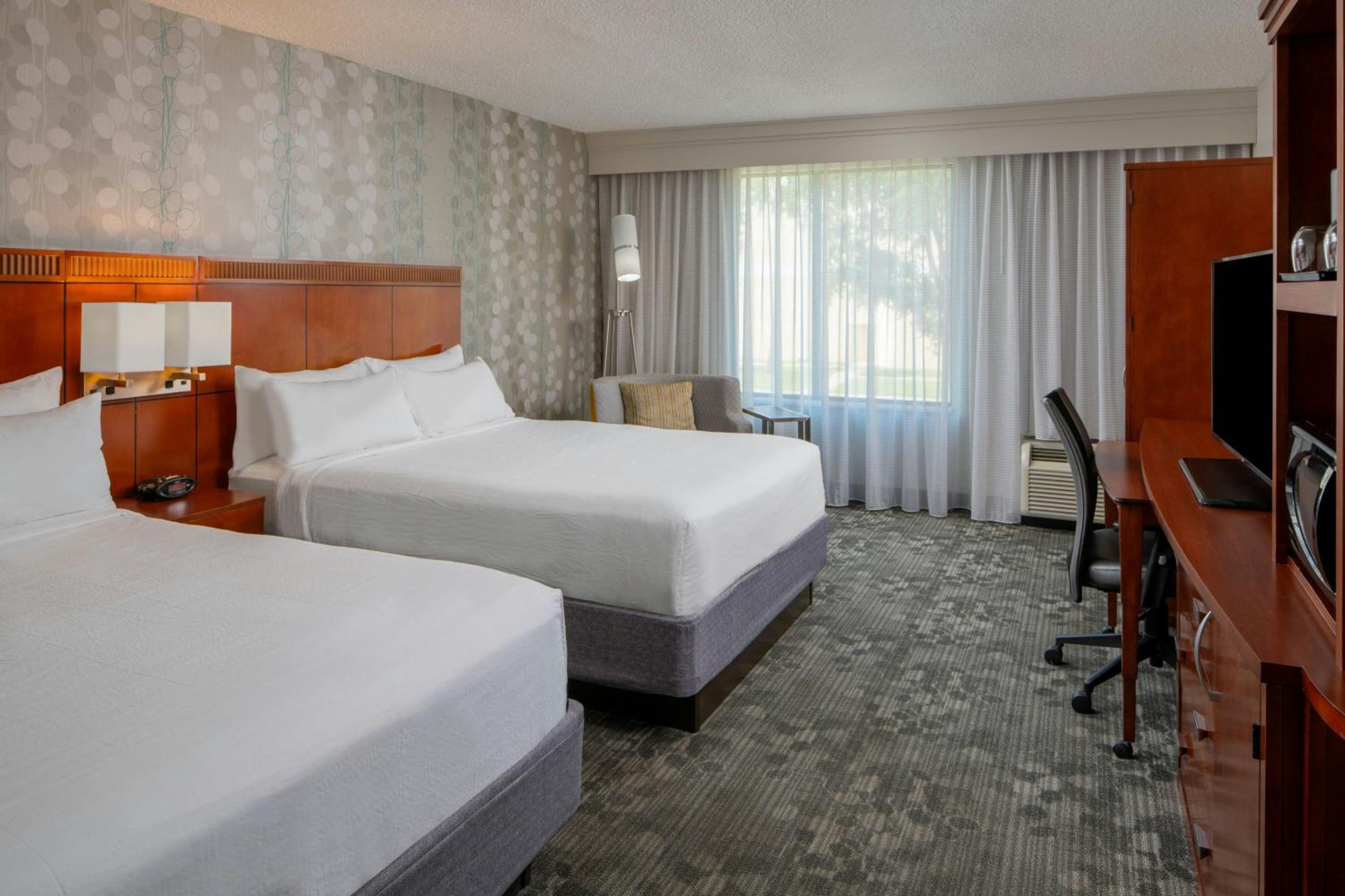 Queen Room with Two Queen Beds - Hearing Accessible photo 1