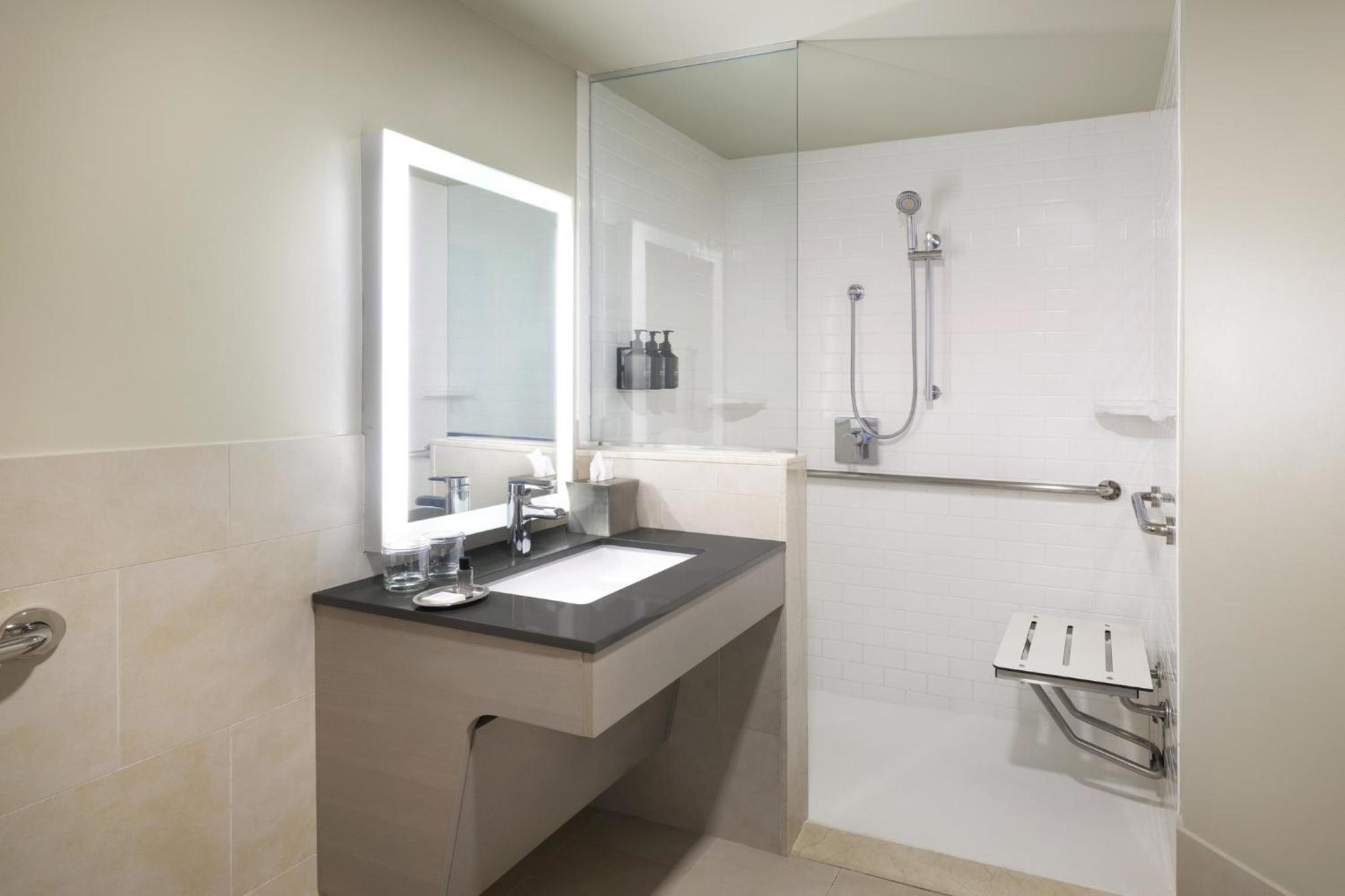 Queen Room with Two Queen Beds and Mobility Accessible Roll-In Shower photo 2