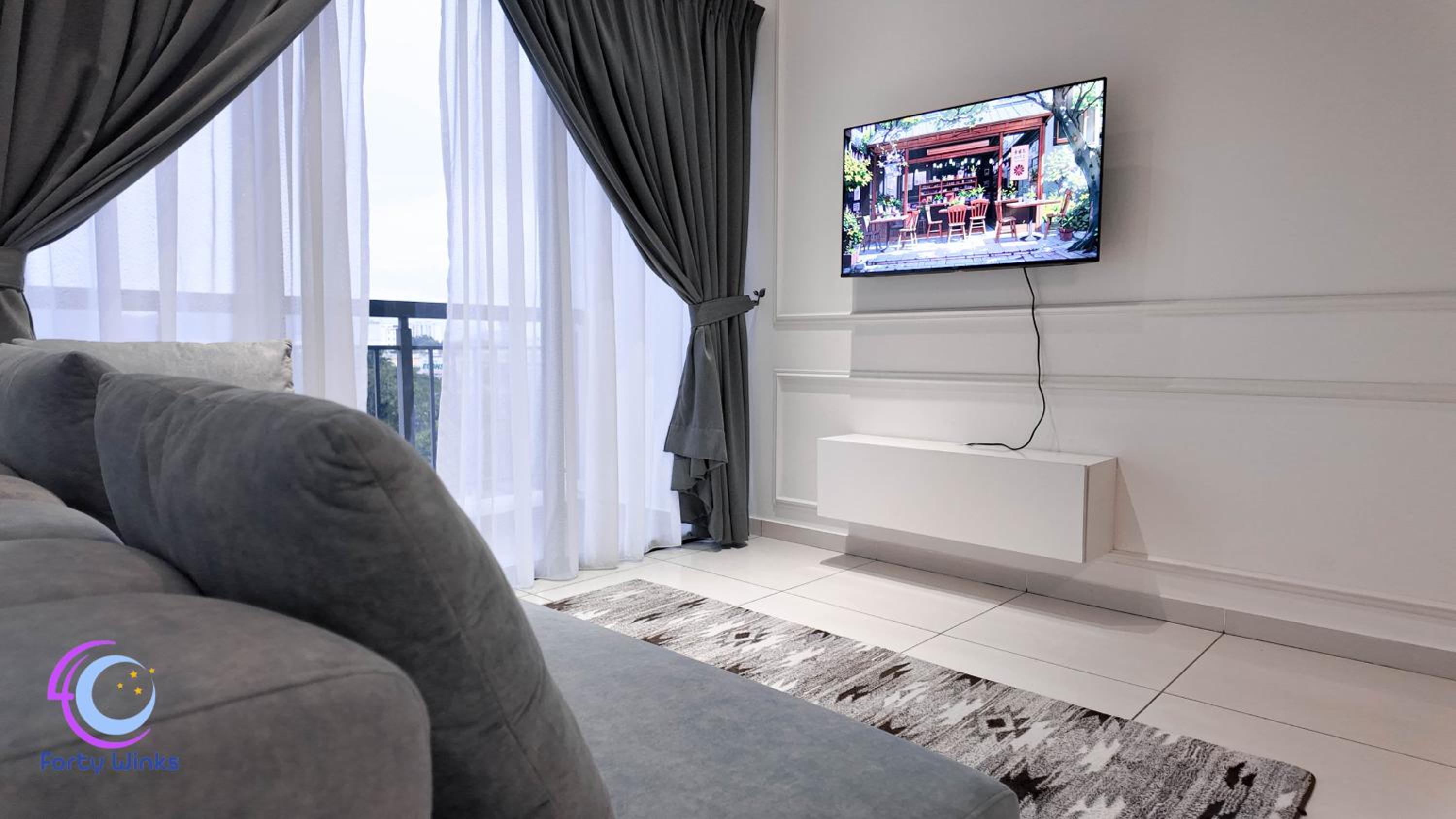 Three-Bedroom Apartment with Balcony - Photo 1