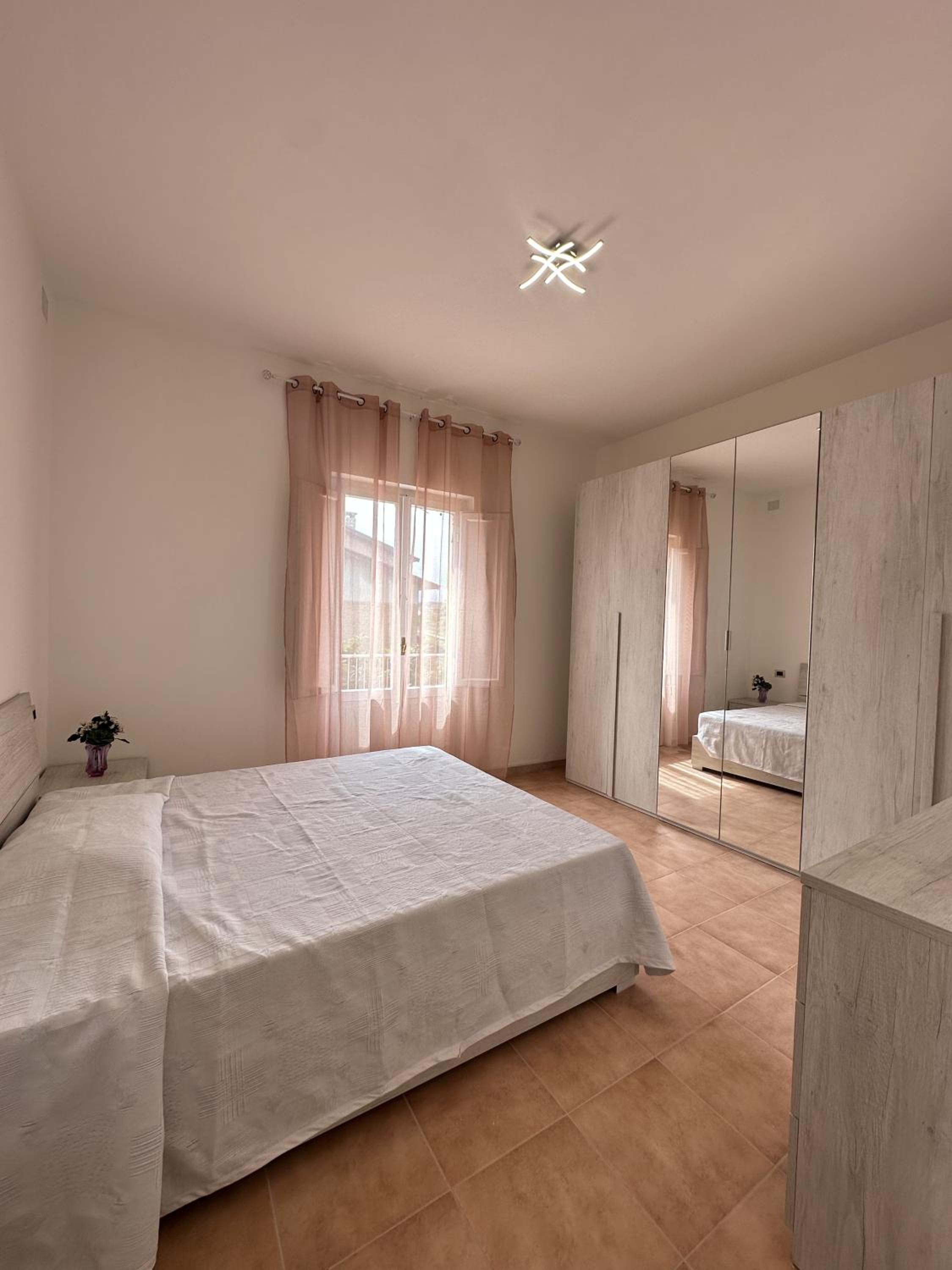 Three-Bedroom Apartment with Balcony