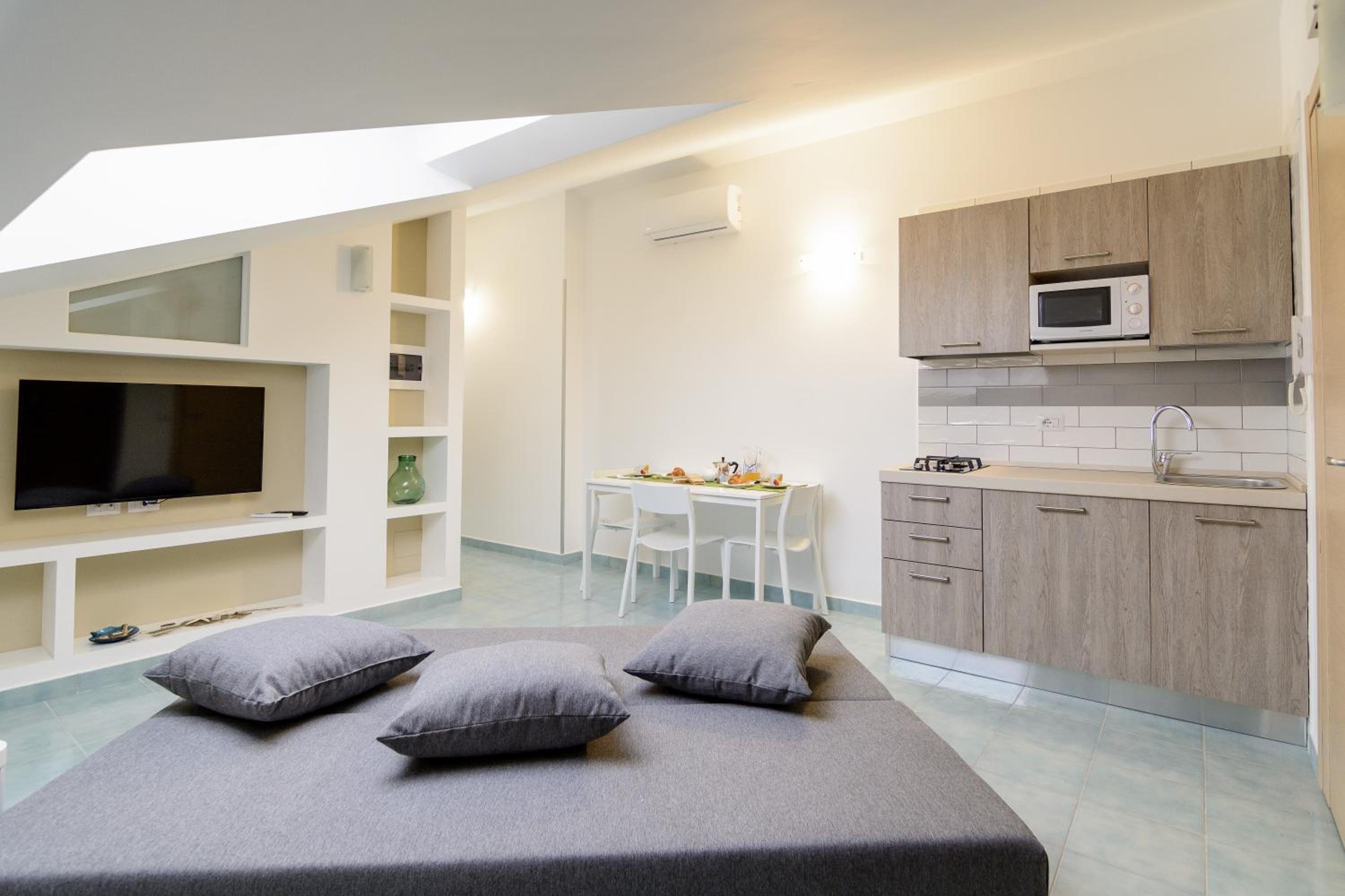 Quadruple Room with Side Sea View