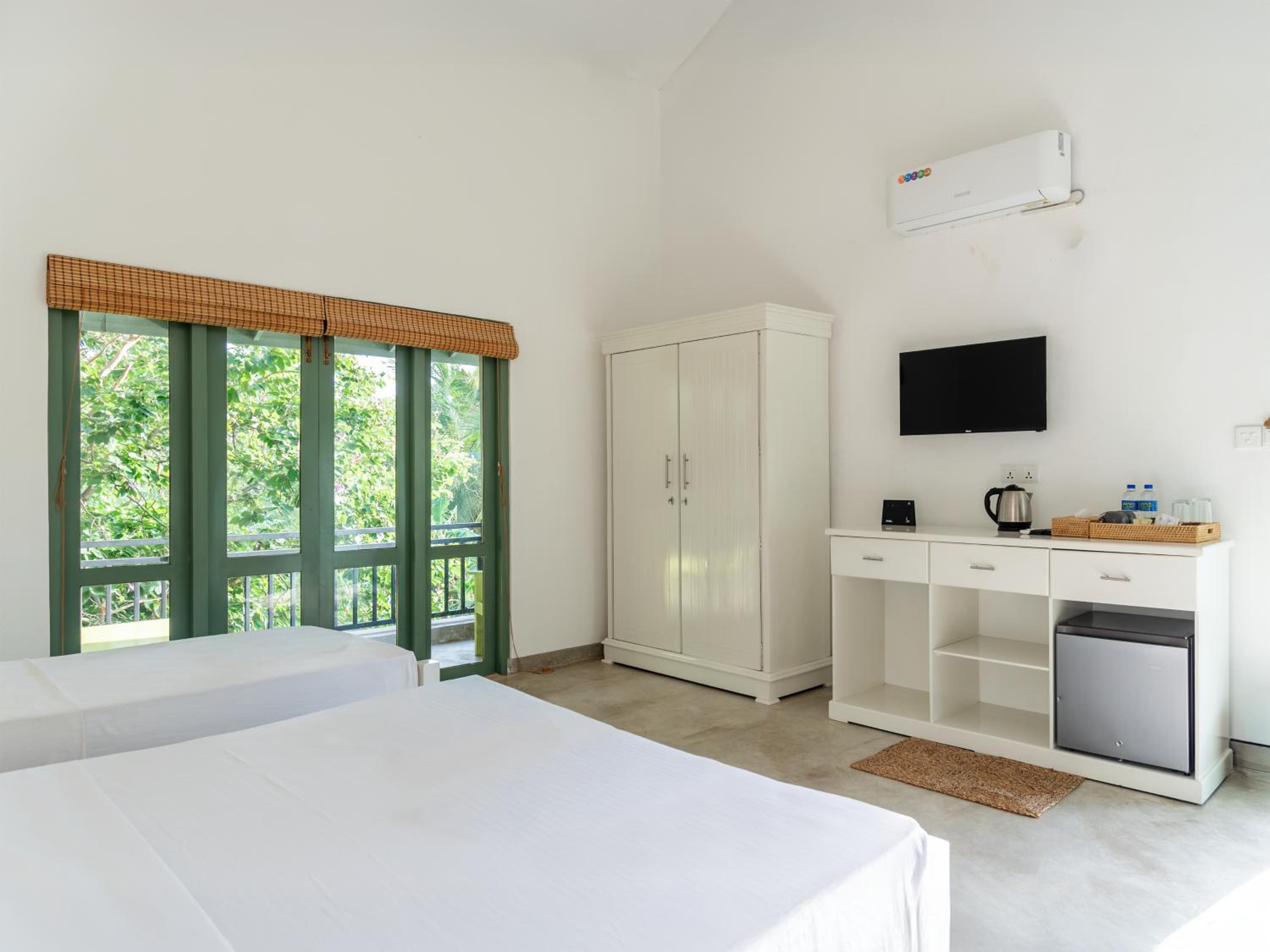 Deluxe Triple Room - Photo 2