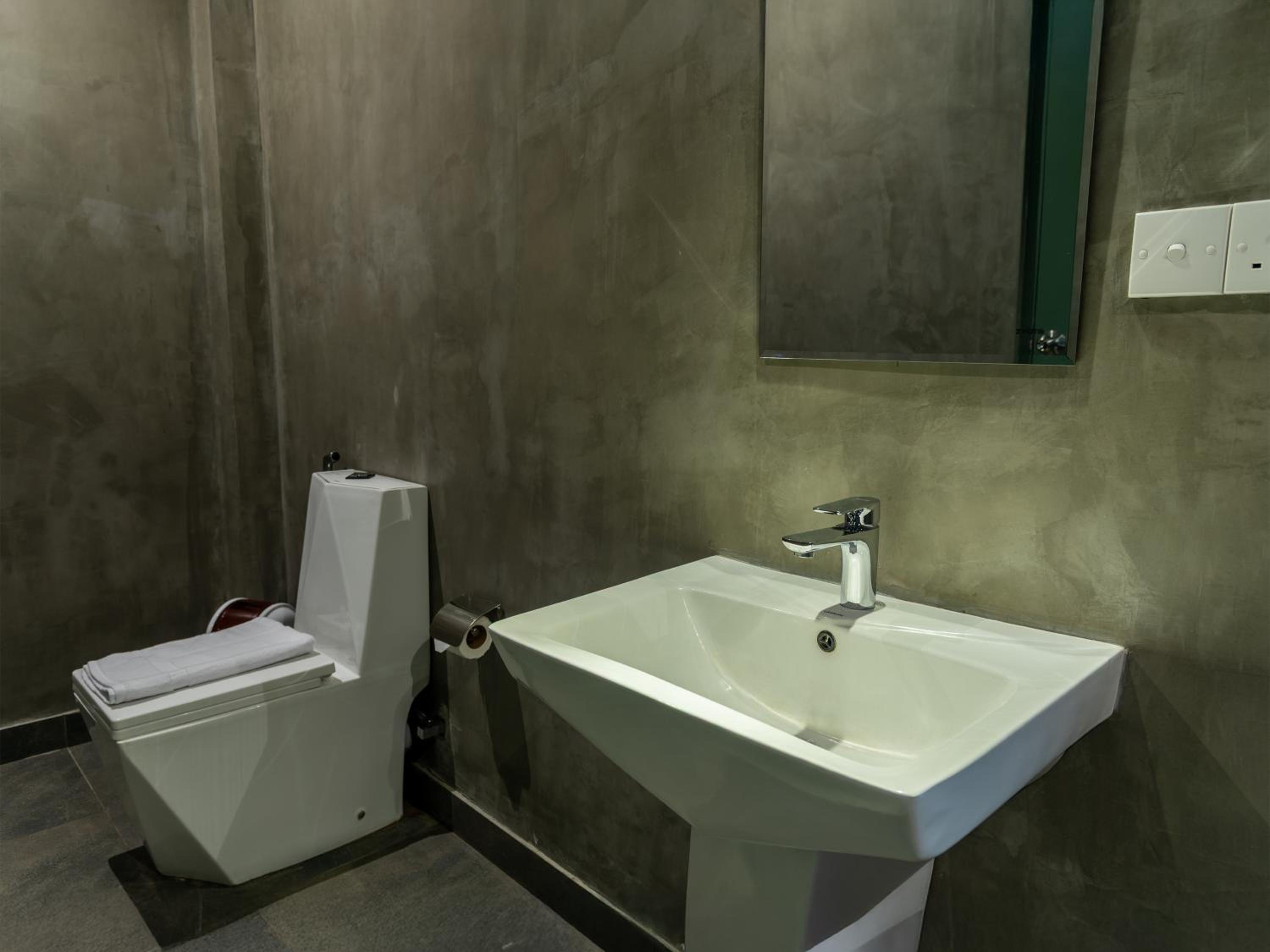Deluxe Triple Room - Photo 8