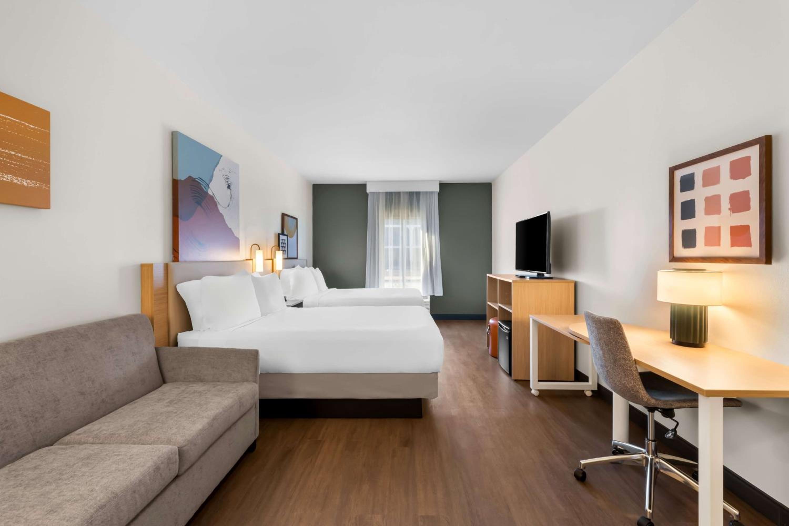 Queen Room with Two Queen Beds and Sofa Bed - Photo 1