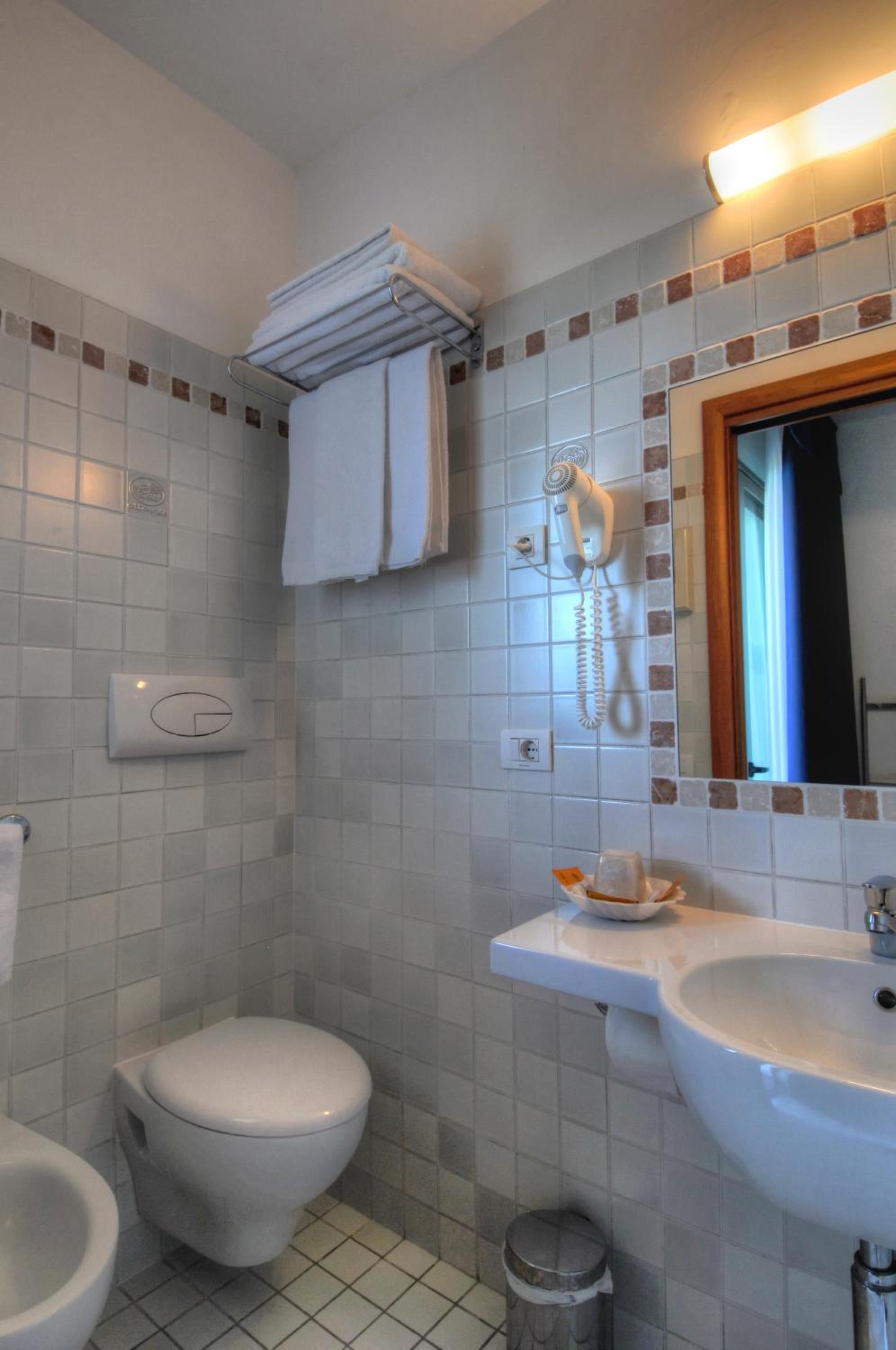 Quadruple Room with Balcony photo 2