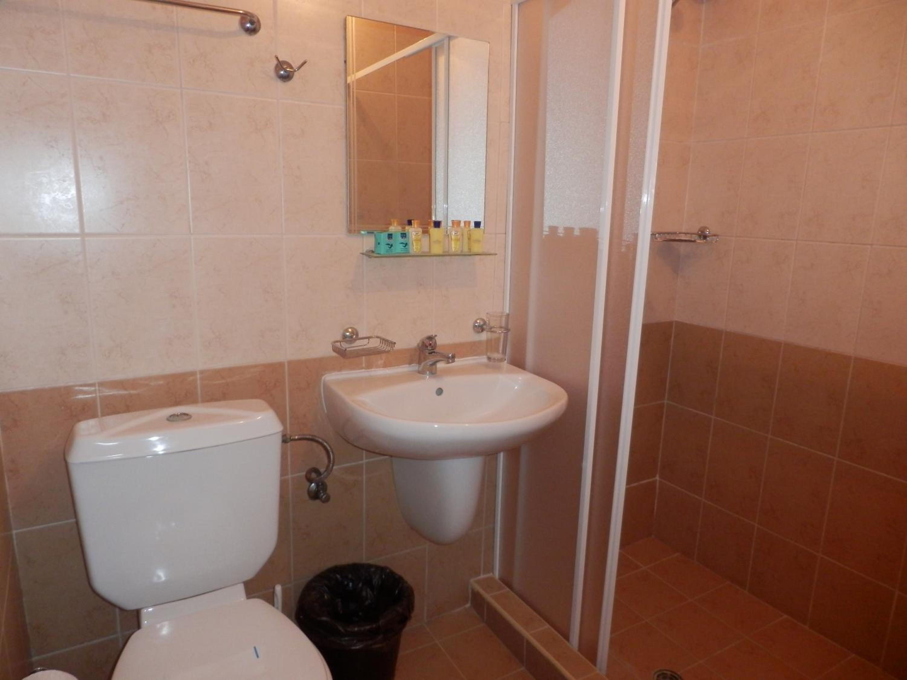 Economy Double Room with Balcony (2 Adults + 1 Child) photo 2
