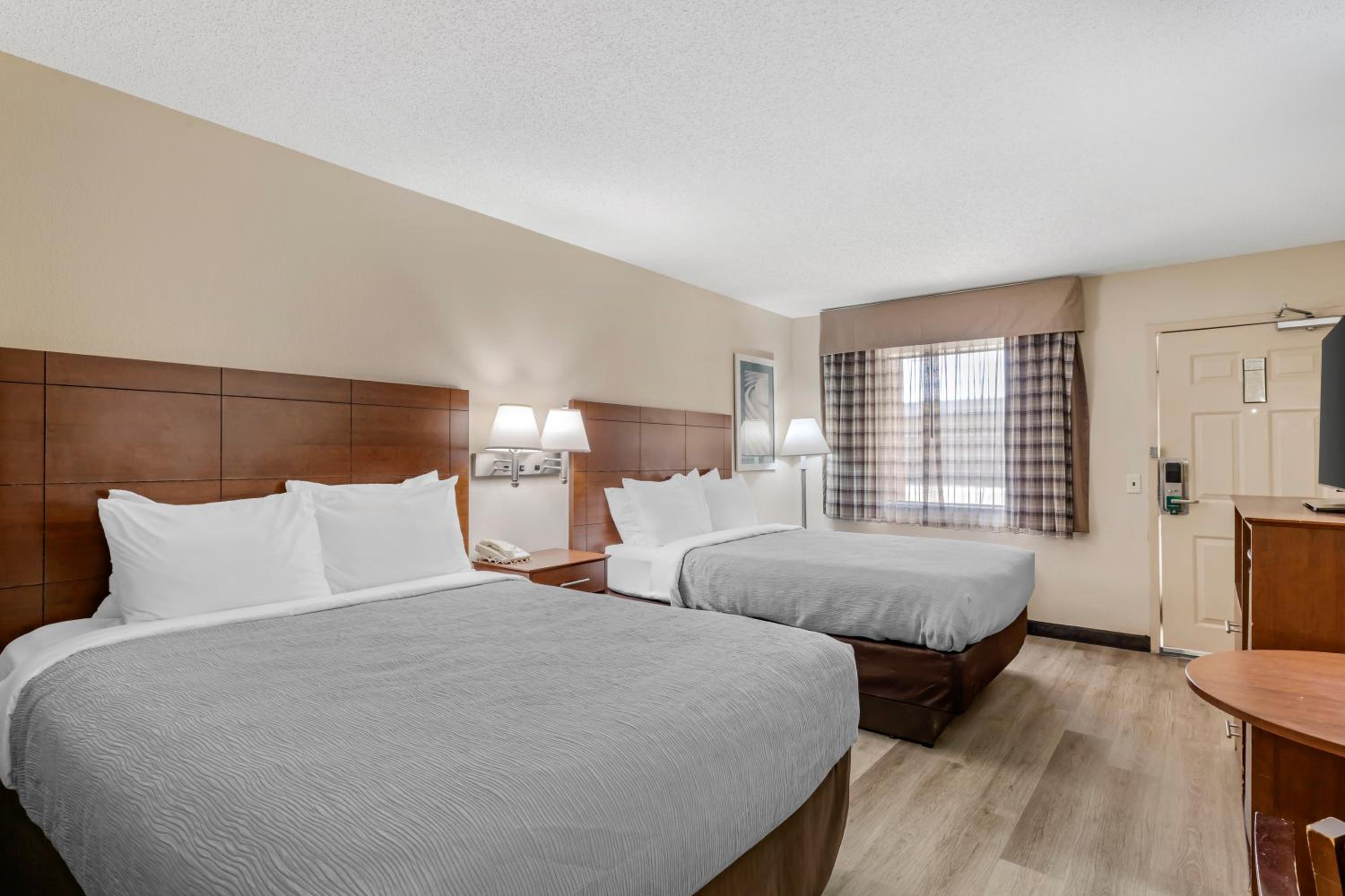 Queen Room with Two Queen Beds and Accessible Tub - Accessible/Non-Smoking - Photo 1