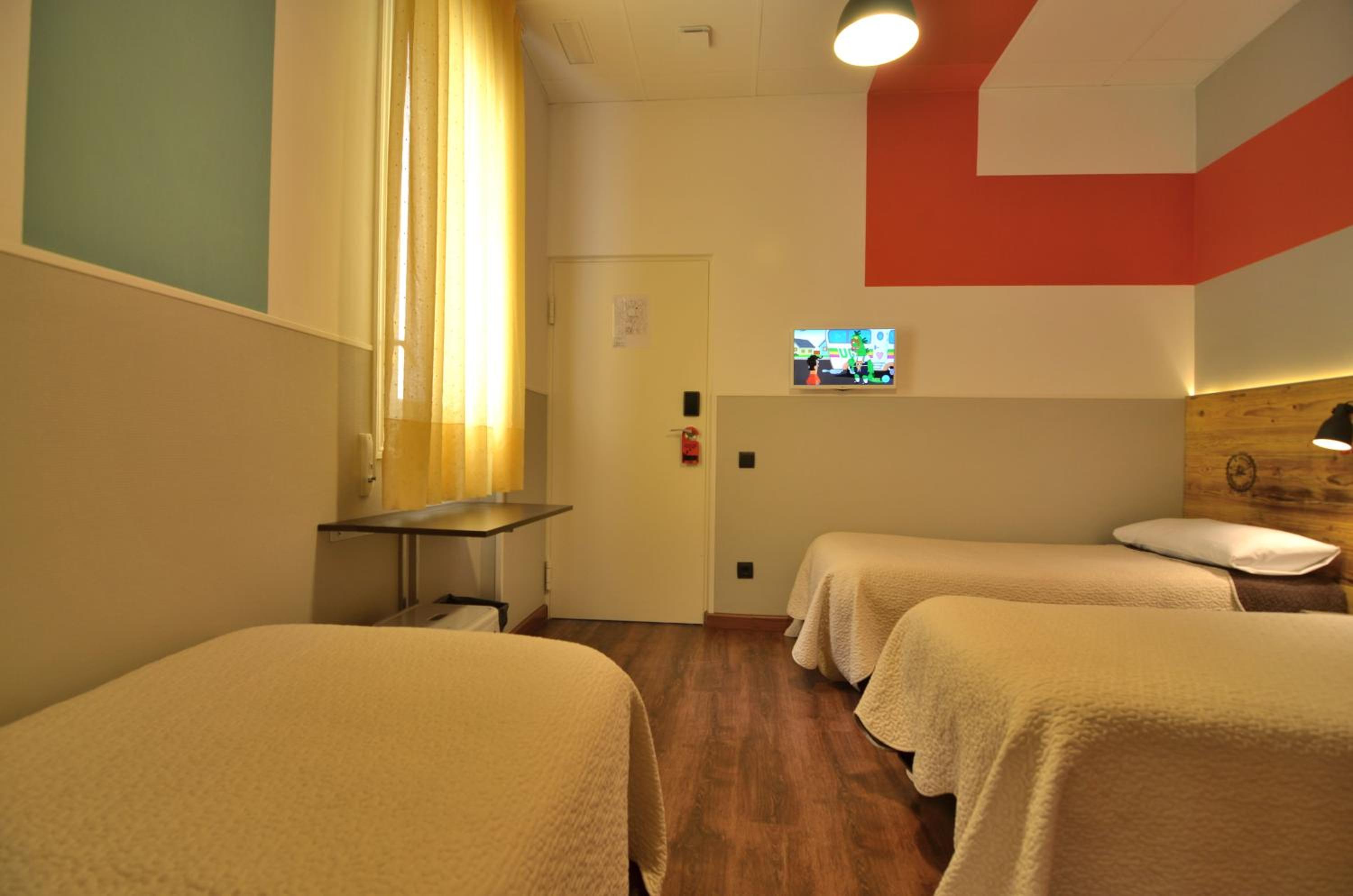 Habitación Triple con Baño Privado