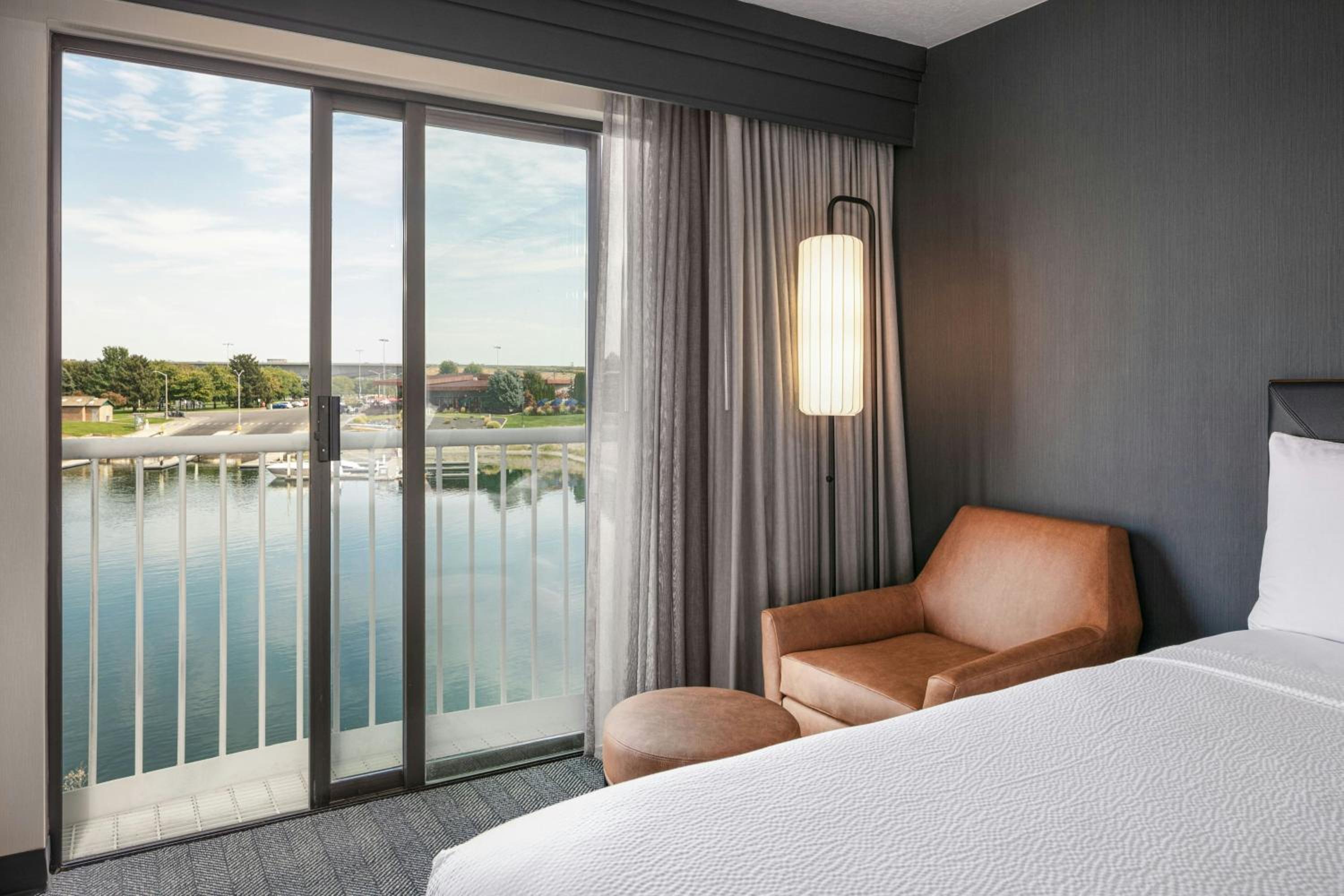 Queen Room with Two Queen Beds and Water View - Photo 3