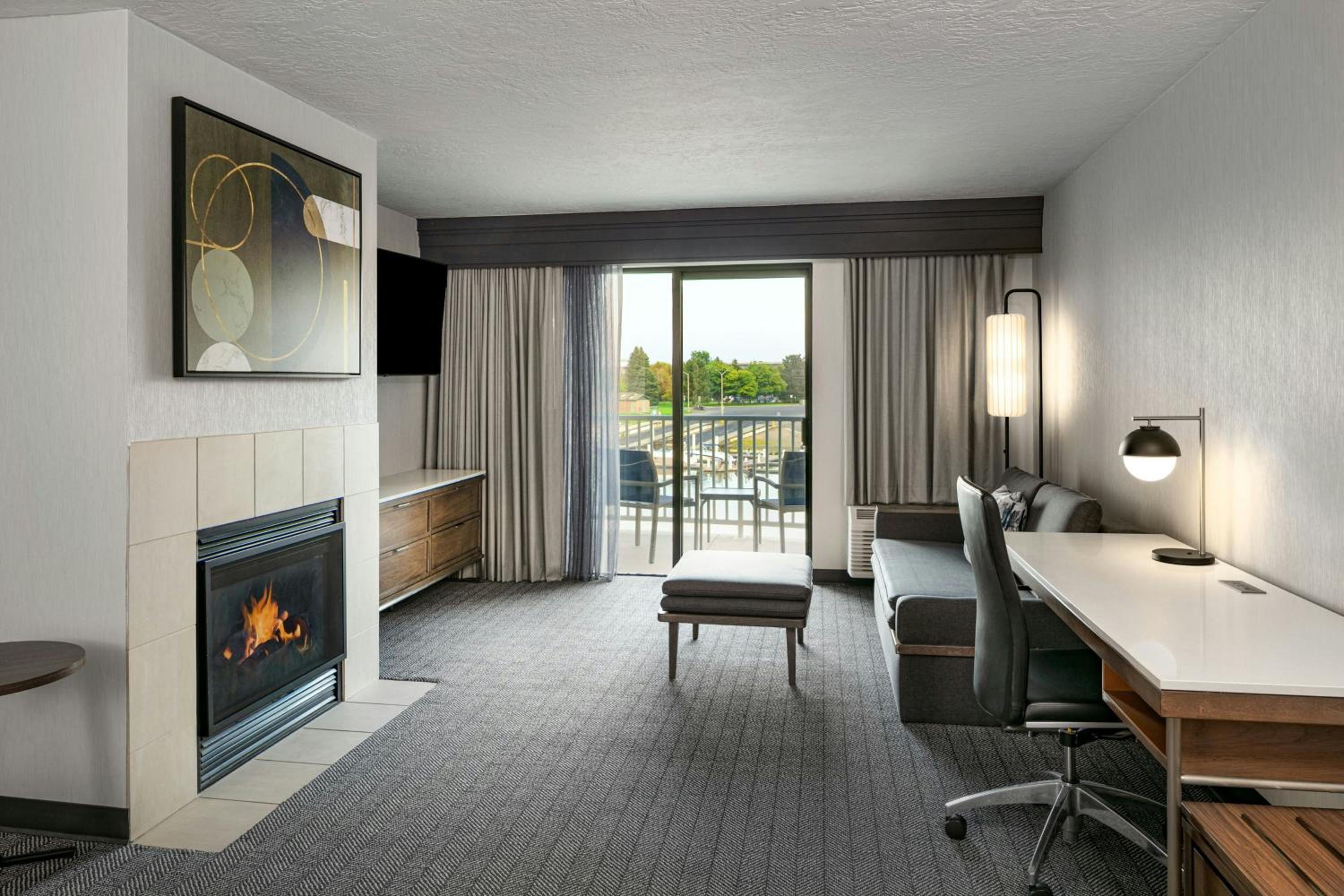 One-Bedroom King Suite with Water View and Sofa Bed - Photo 1