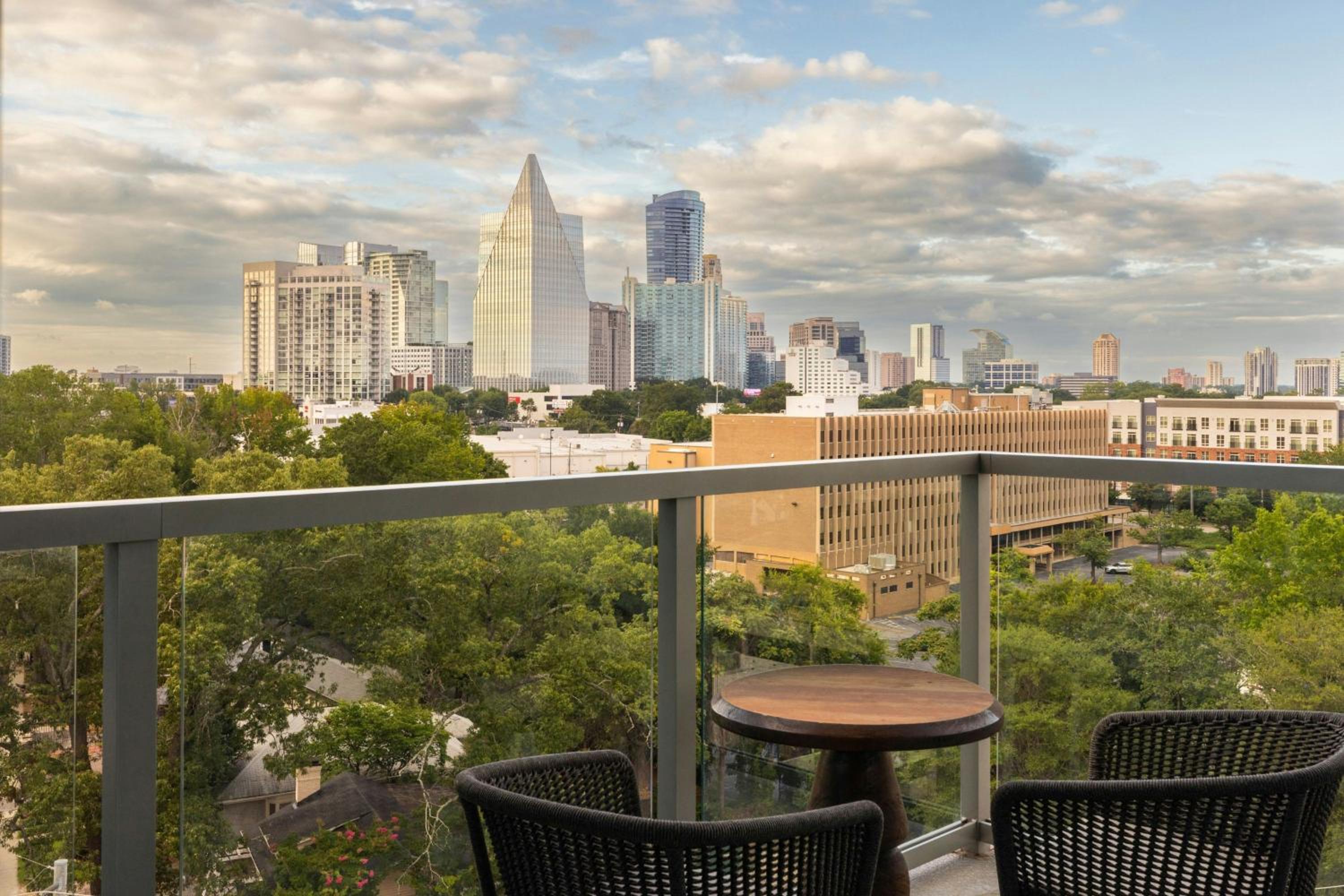 One-Bedroom Suite with One King Bed, City View, and Balcony