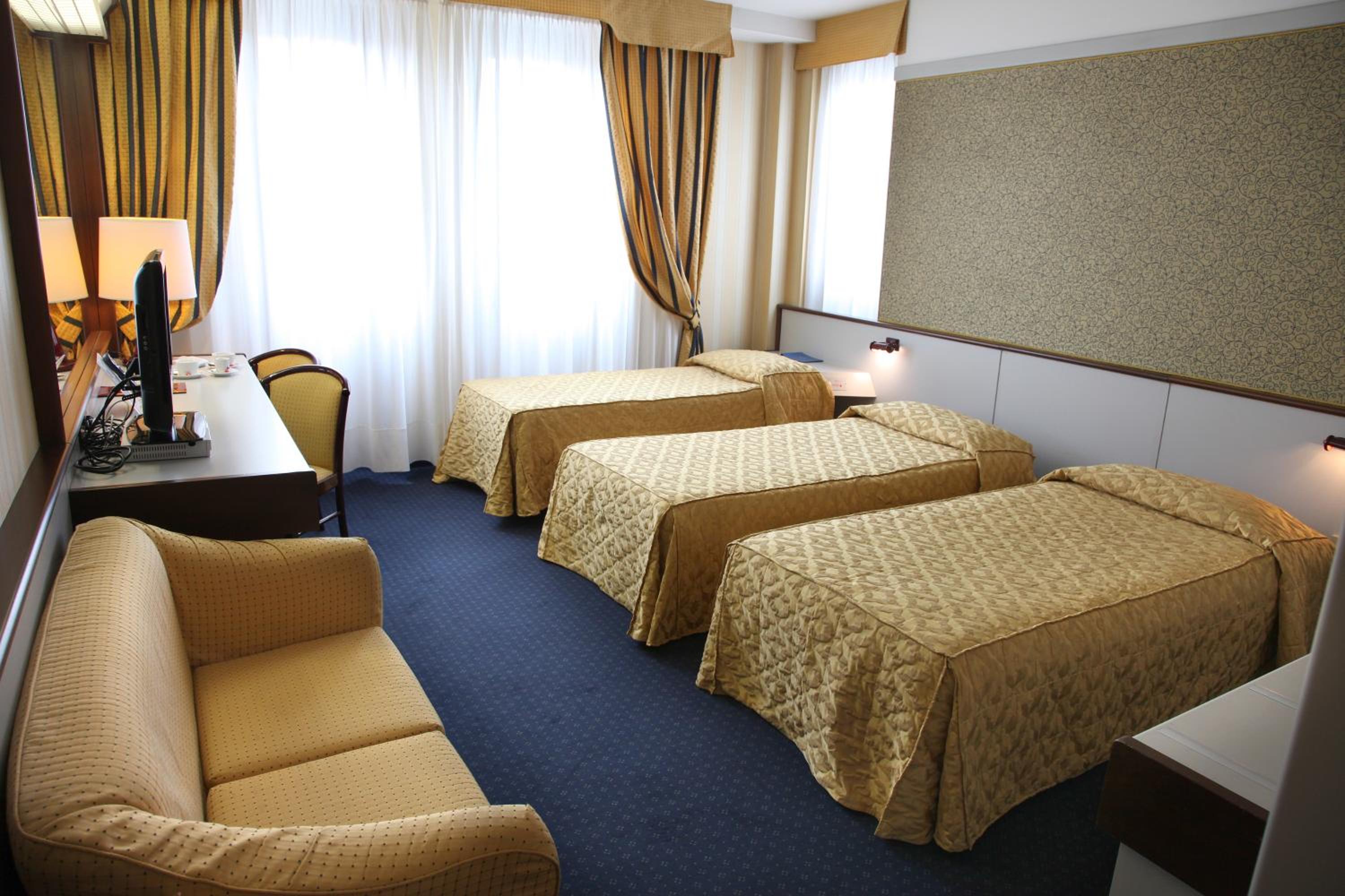 Relax in our spacious and elegant hotel room!