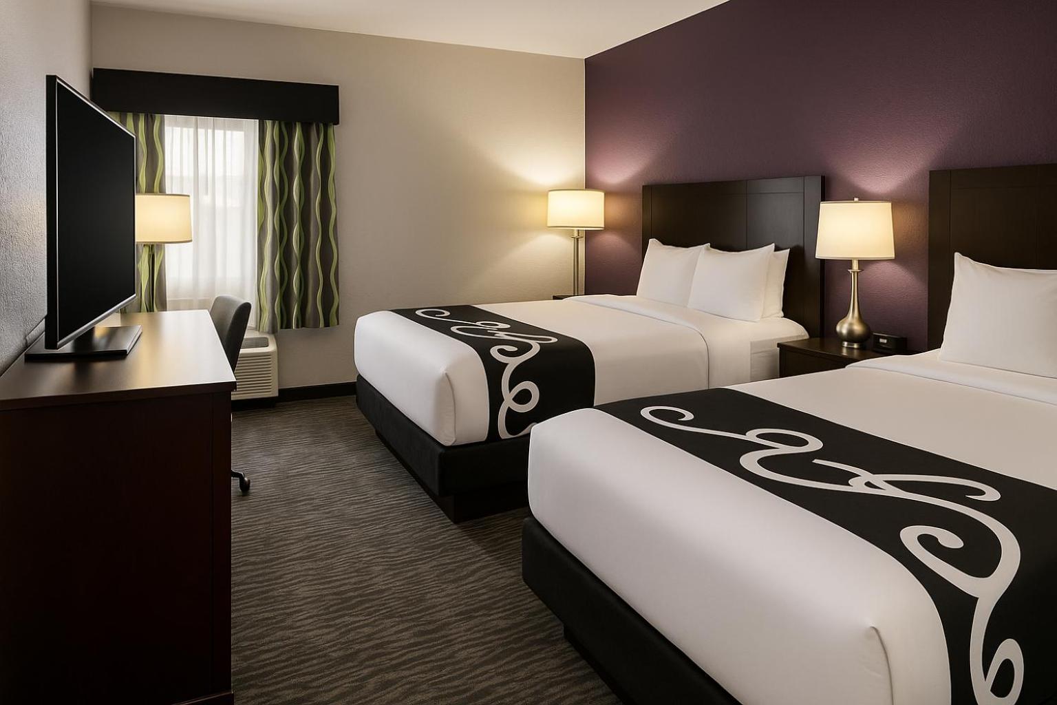 Deluxe Queen Room with Two Queen Beds - Photo 1