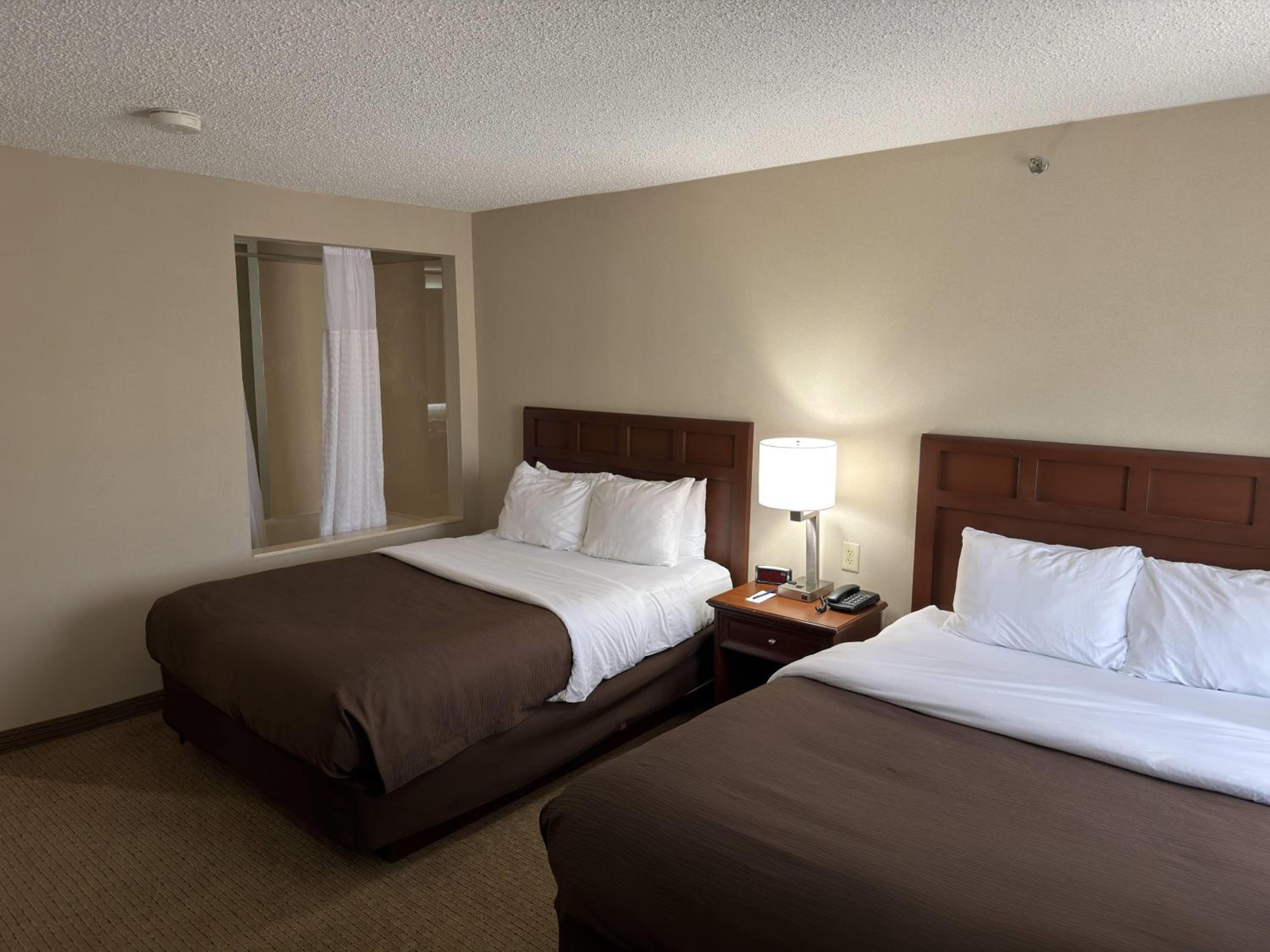 Deluxe Queen Room with Two Queen Beds - Non-Smoking photo 2