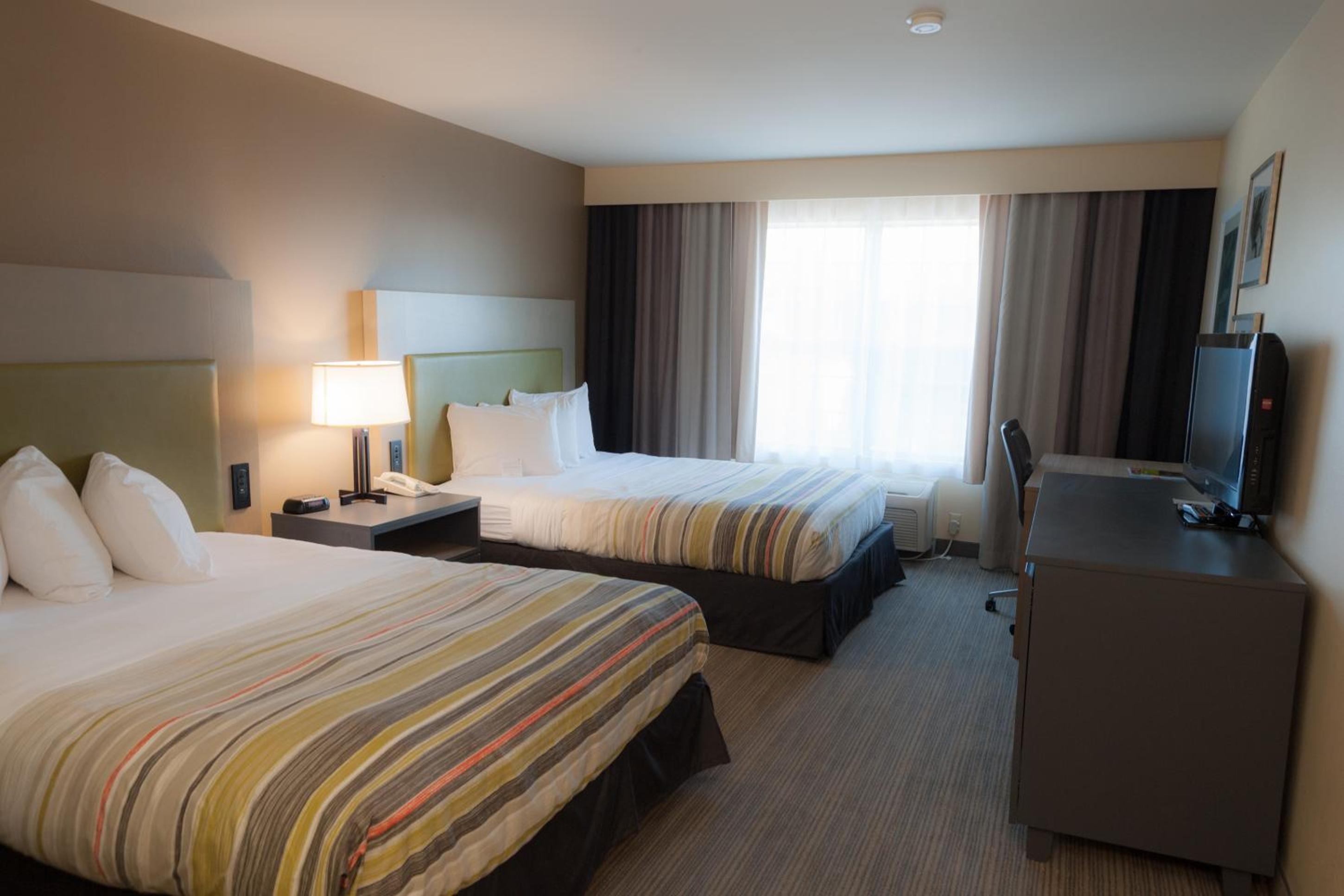 Queen Room with Two Queen Beds - Disability Access/Non-Smoking photo 1