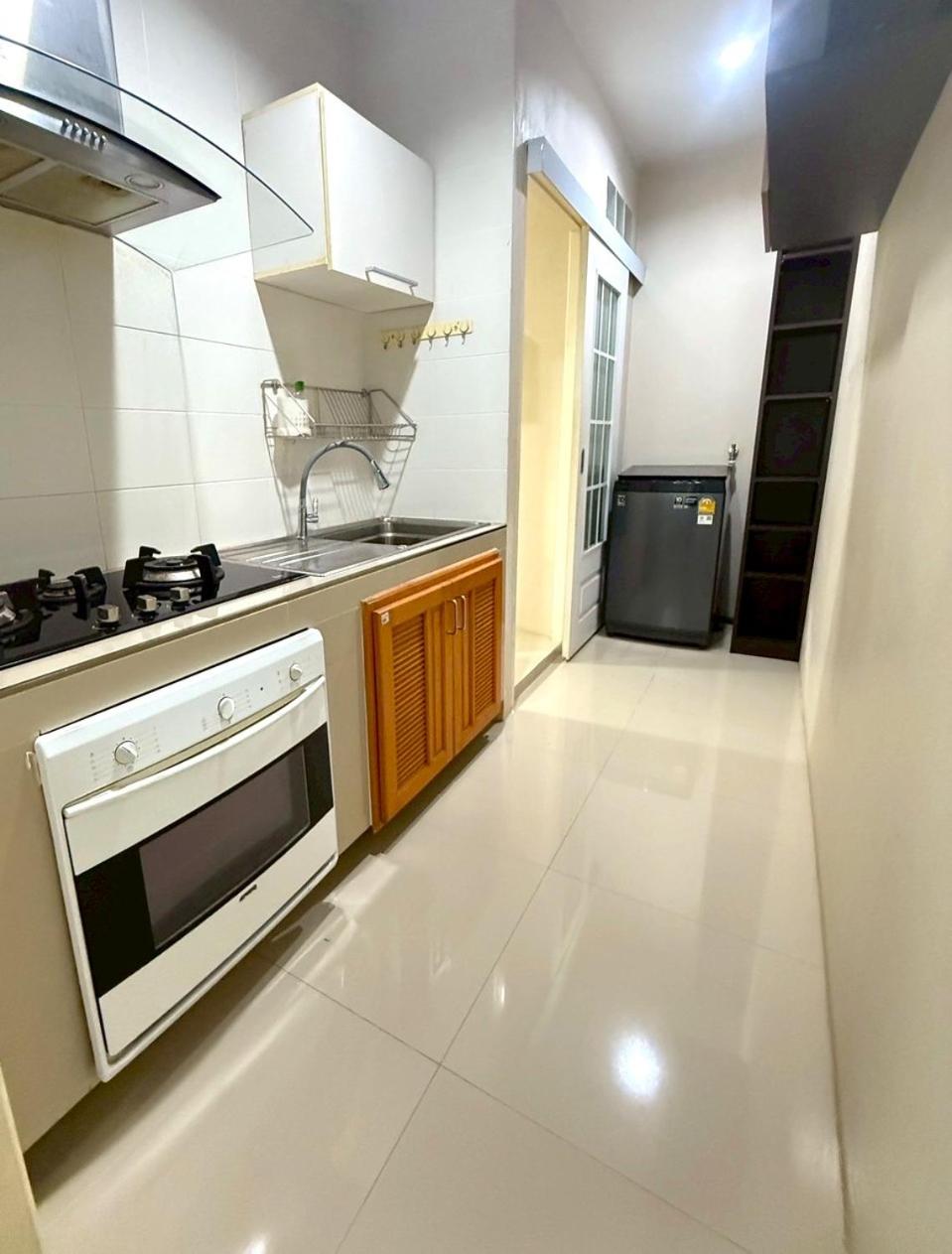 Three-Bedroom Apartment - Photo 5