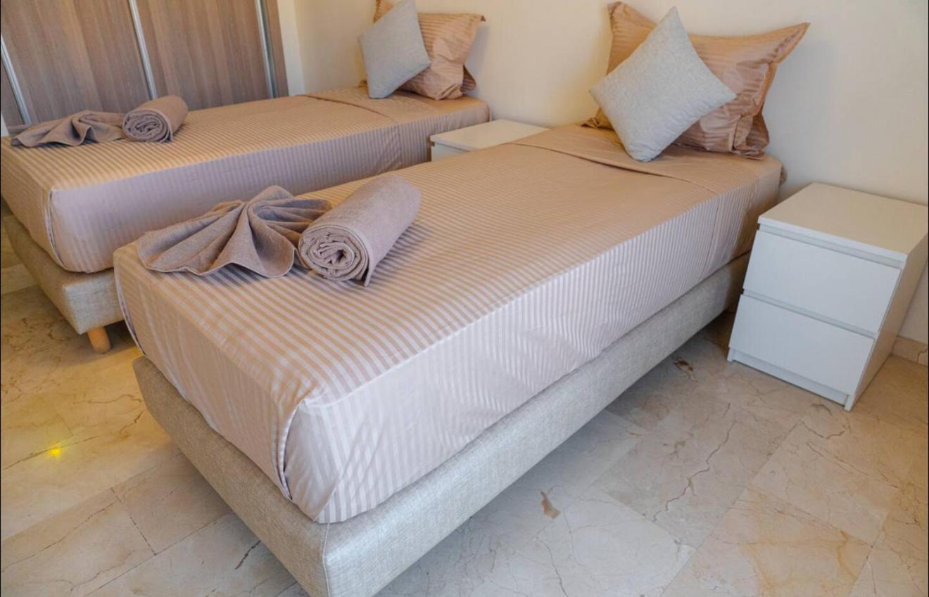 Three-Bedroom Apartment with Balcony photo 3