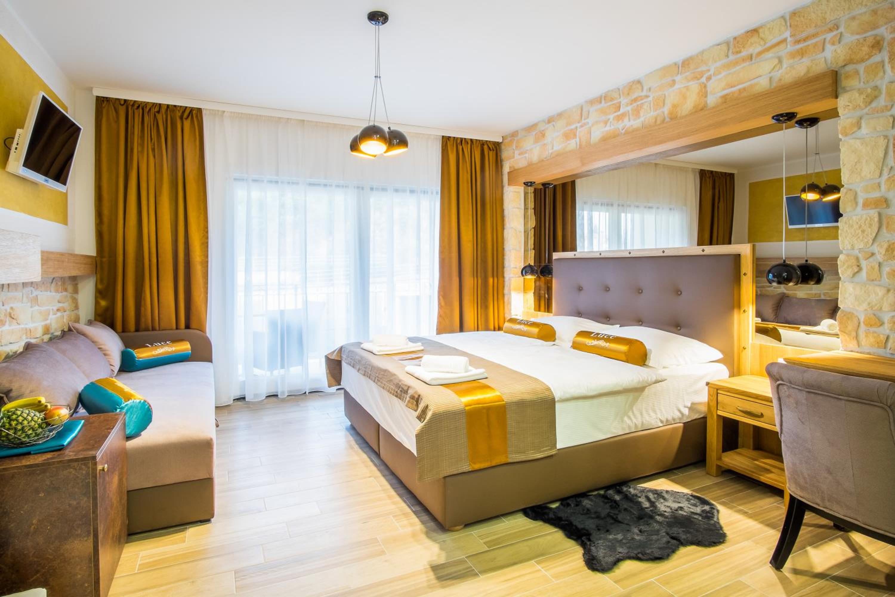 Quarto Triplo Deluxe com Varanda