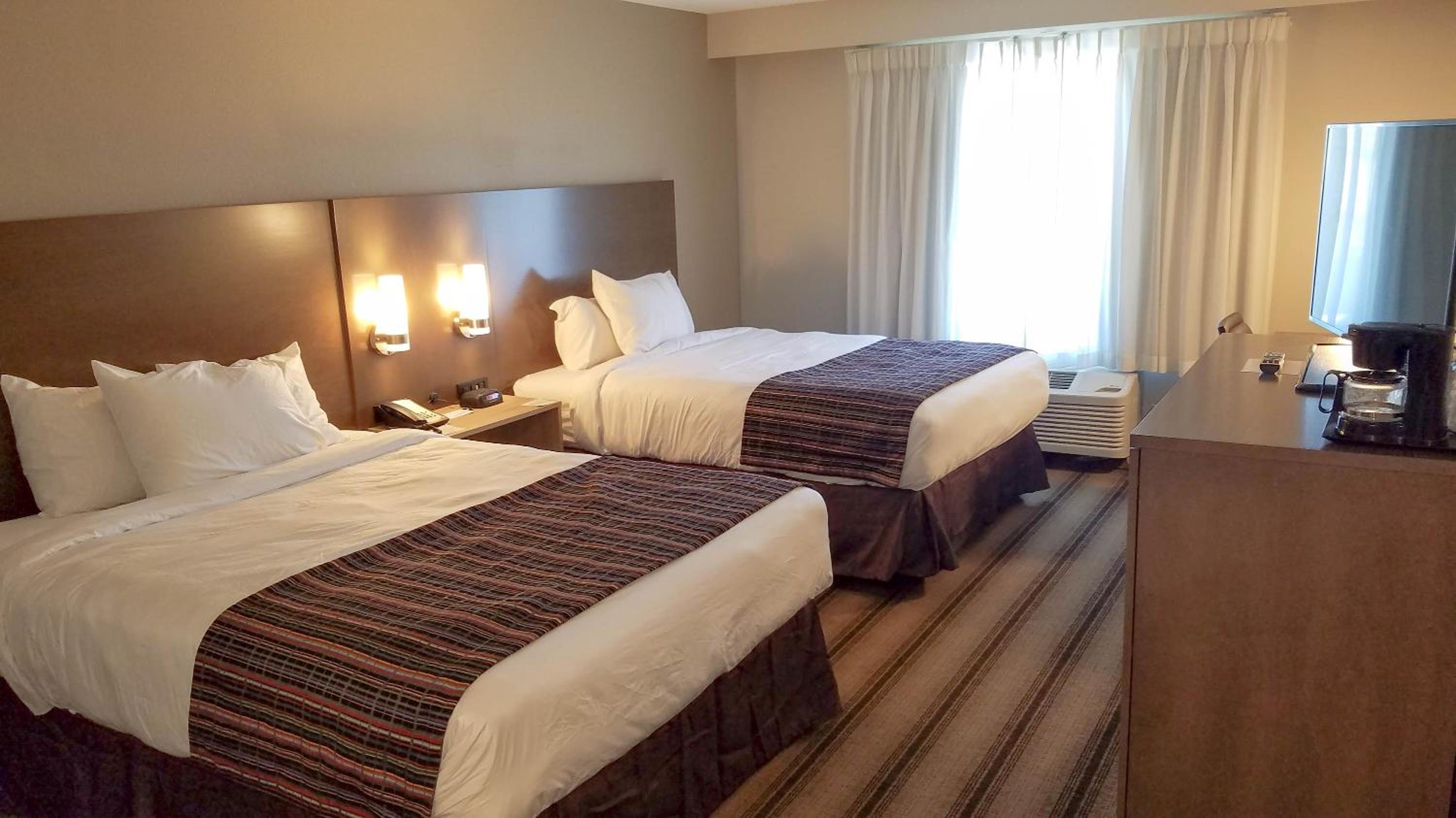 Queen Room with Two Queen Beds - Photo 1