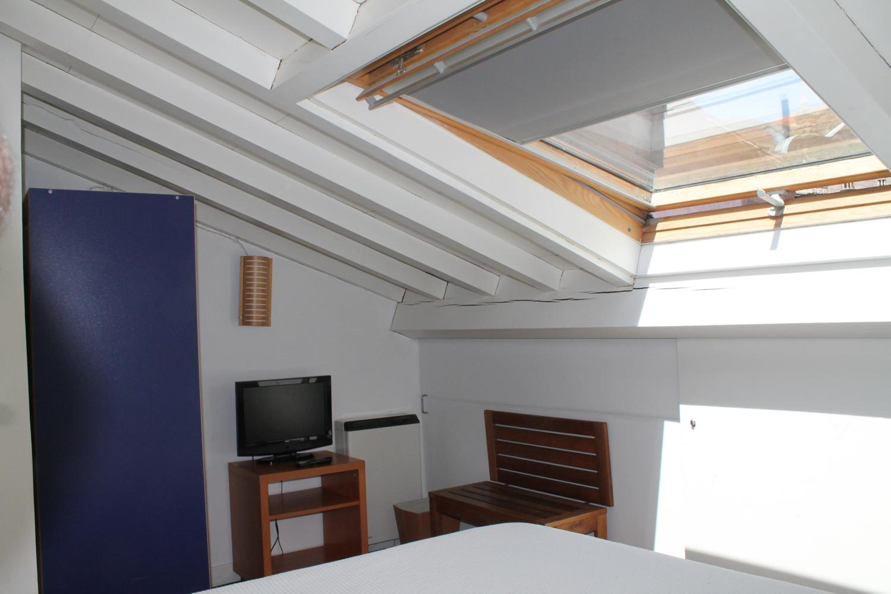 Habitación Triple con Baño Privado