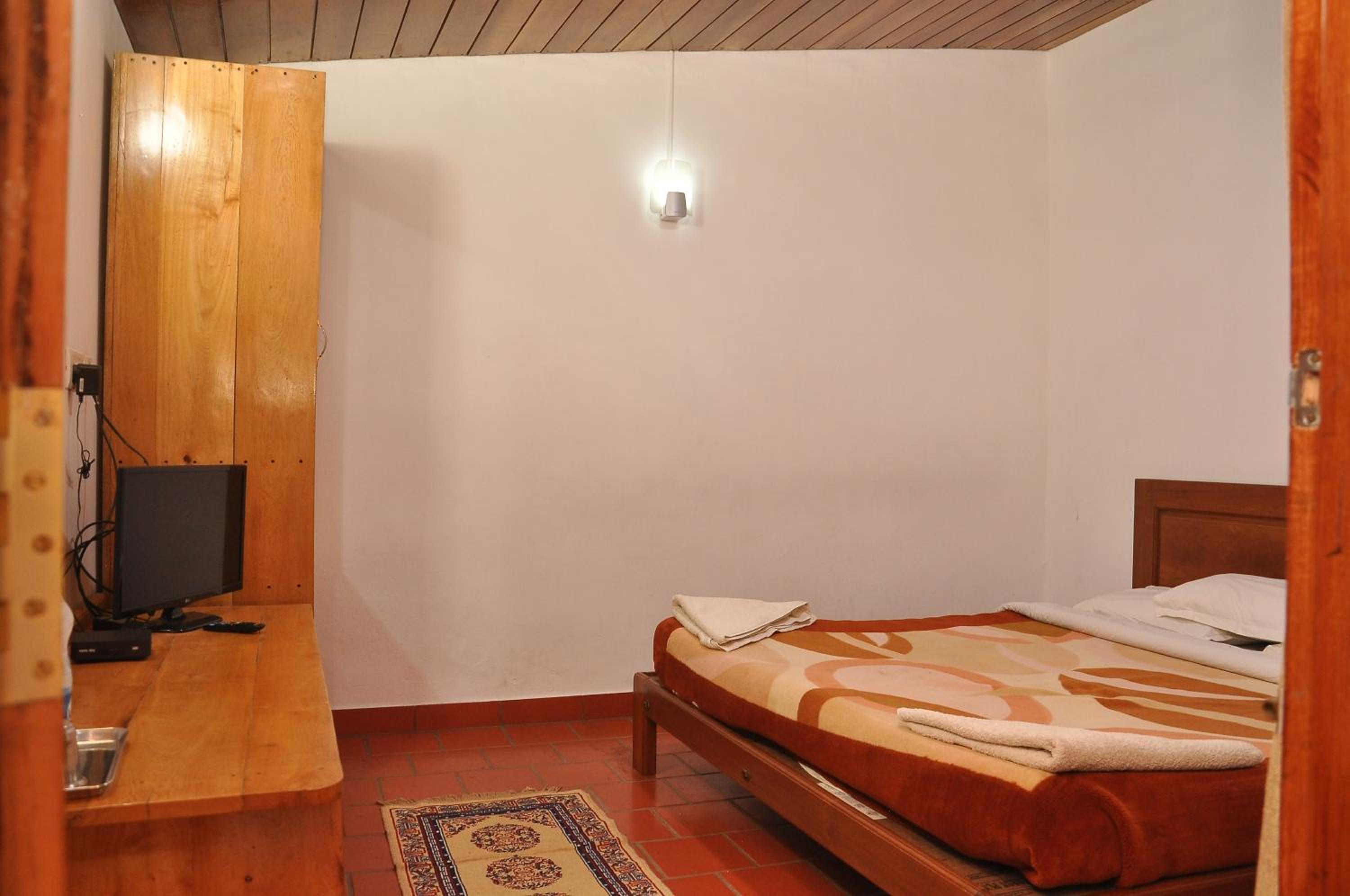 Deluxe Double Room (2 Adults + 1 Child) photo 2