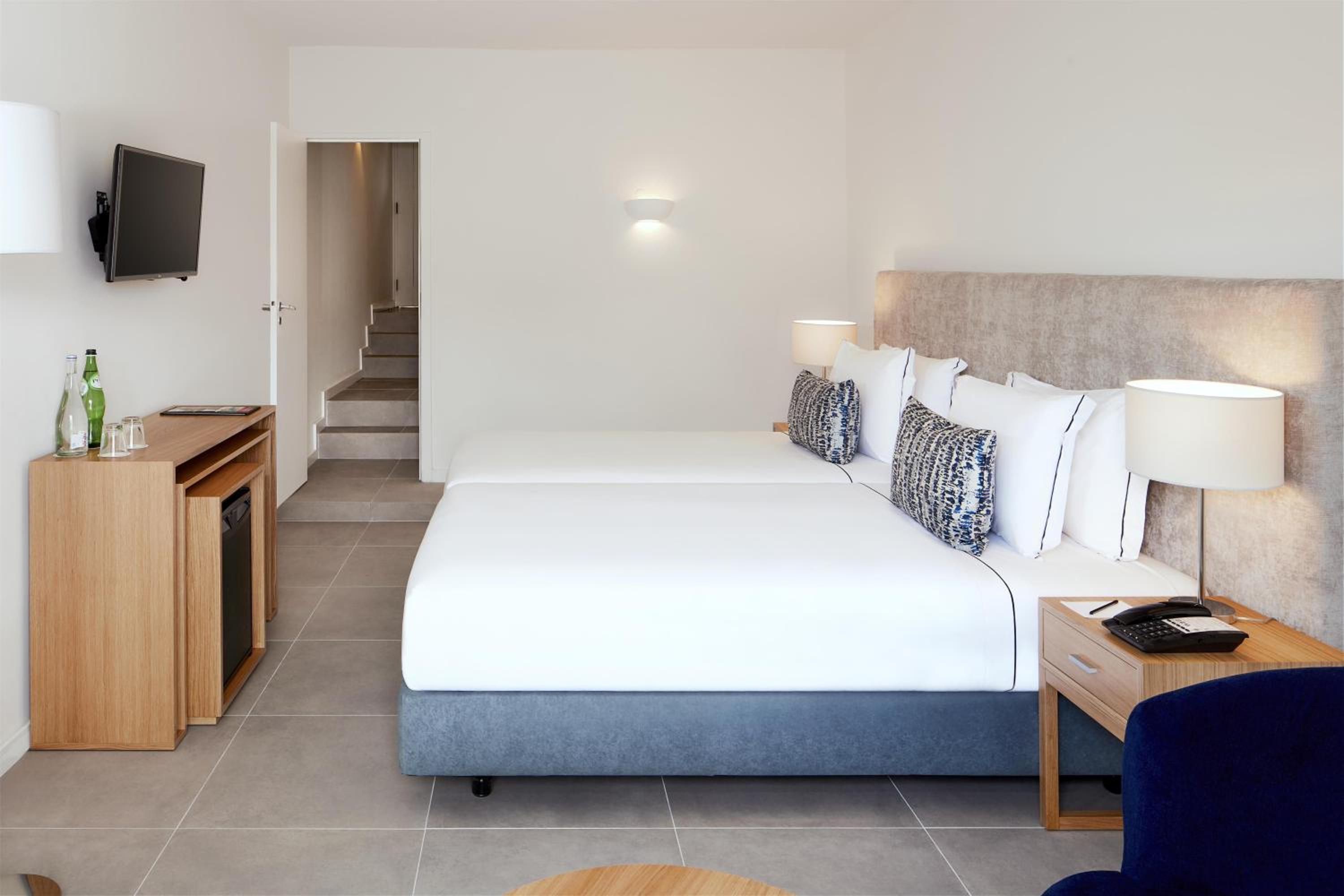Family Connecting Room with Extra bed (4 Adults + 1 Child)