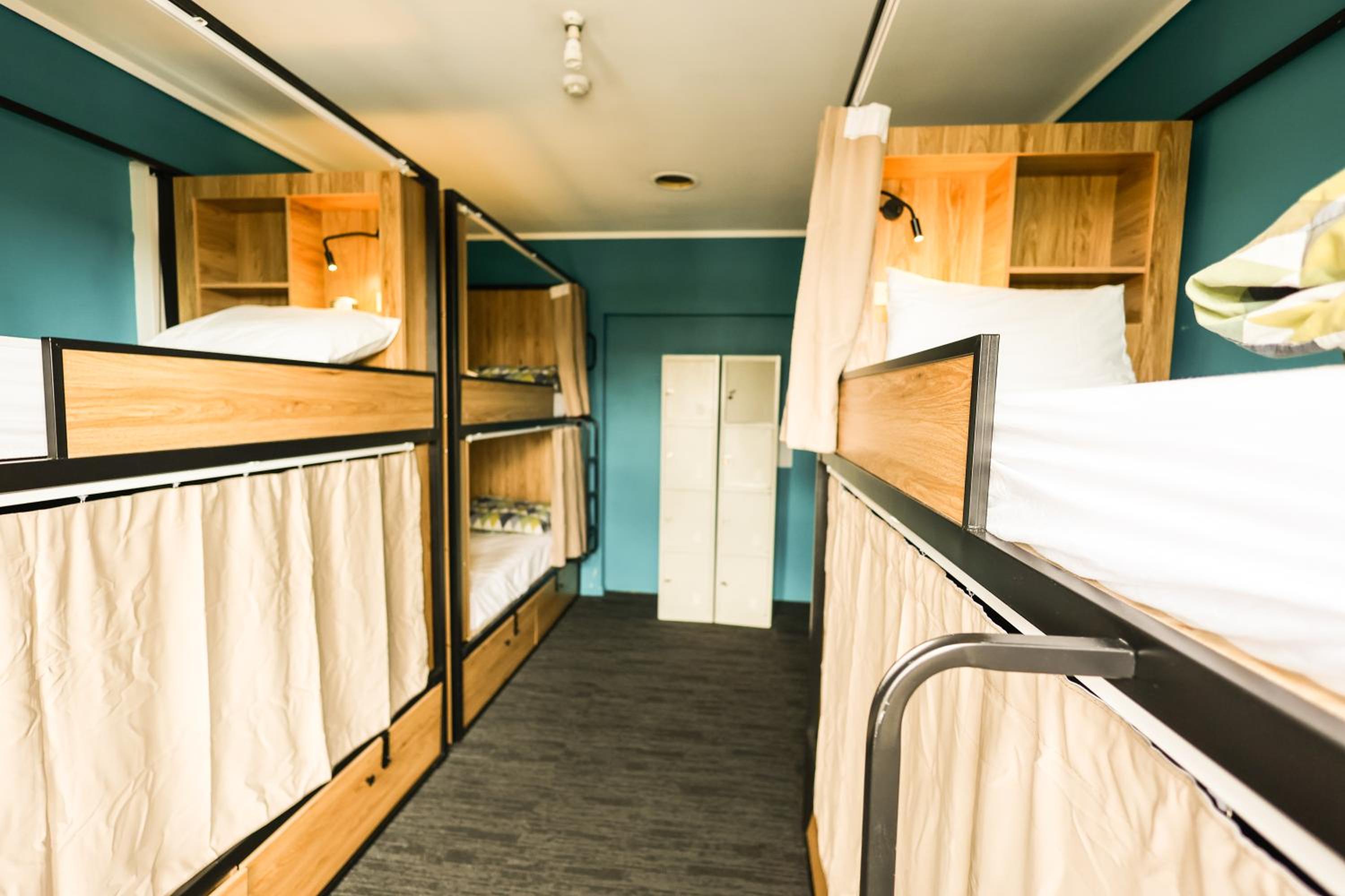 Comfort 10-Bed Mixed Dormitory with Power, Fan, Light & Privacy Curtain
