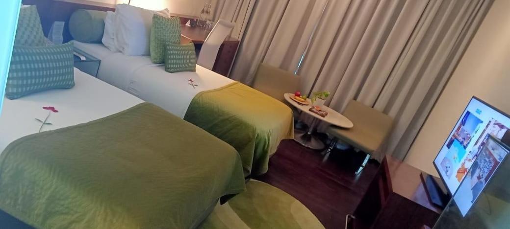 Luxury Premium Twin Room with 15% off Spa and Salon services,15% Discount on Food and Soft Beverages , Happy Hours – 11:30 AM to 07:00 PM photo 2