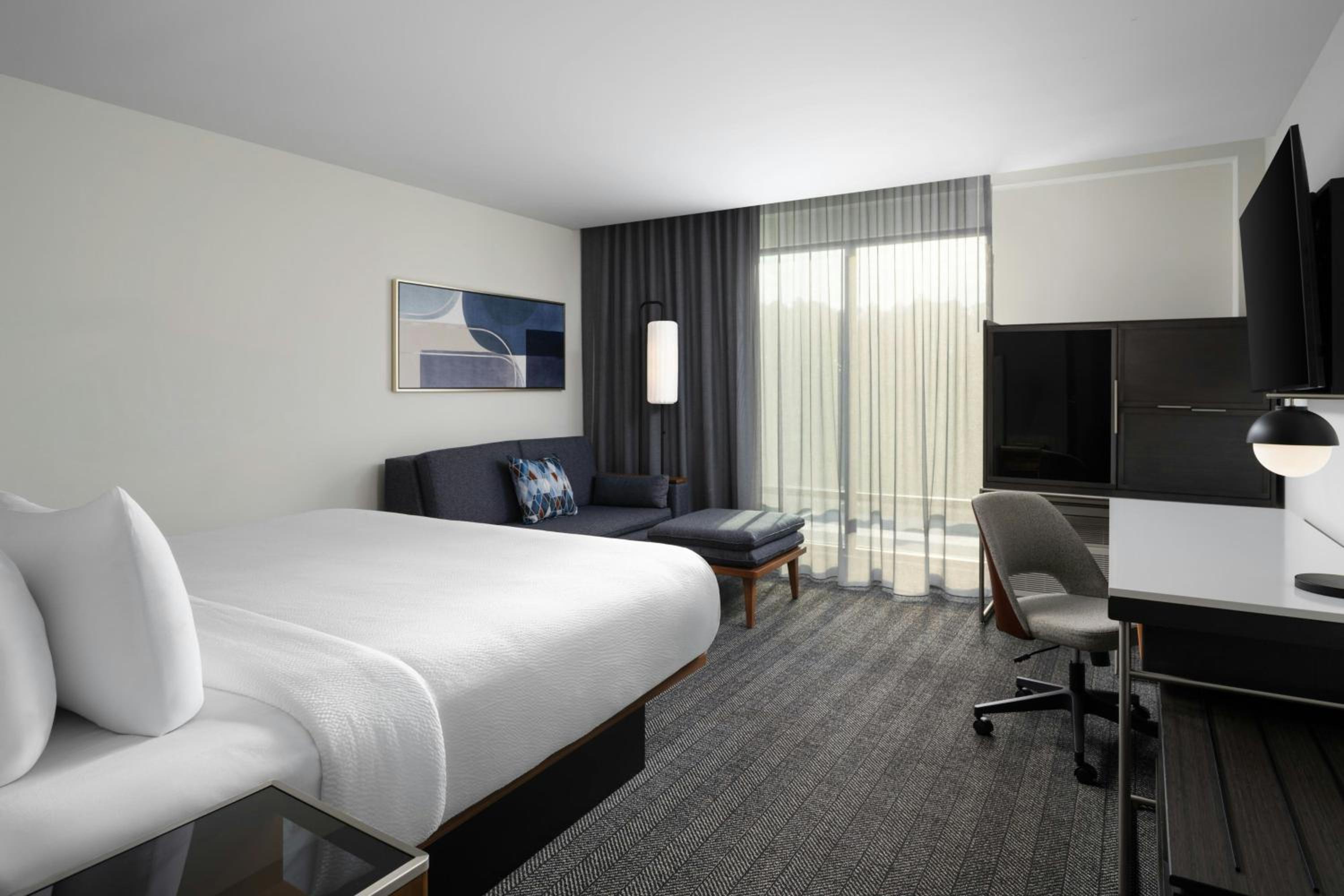 King Room with Sofa Bed and Roll-in Shower - Mobility and Hearing Accessible - Photo 7