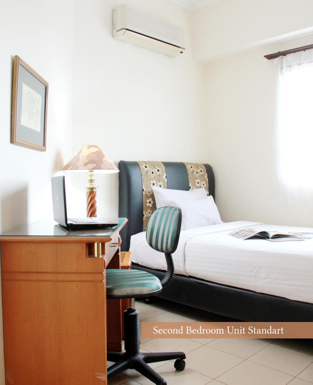 Three-Bedroom Suite - Photo 16