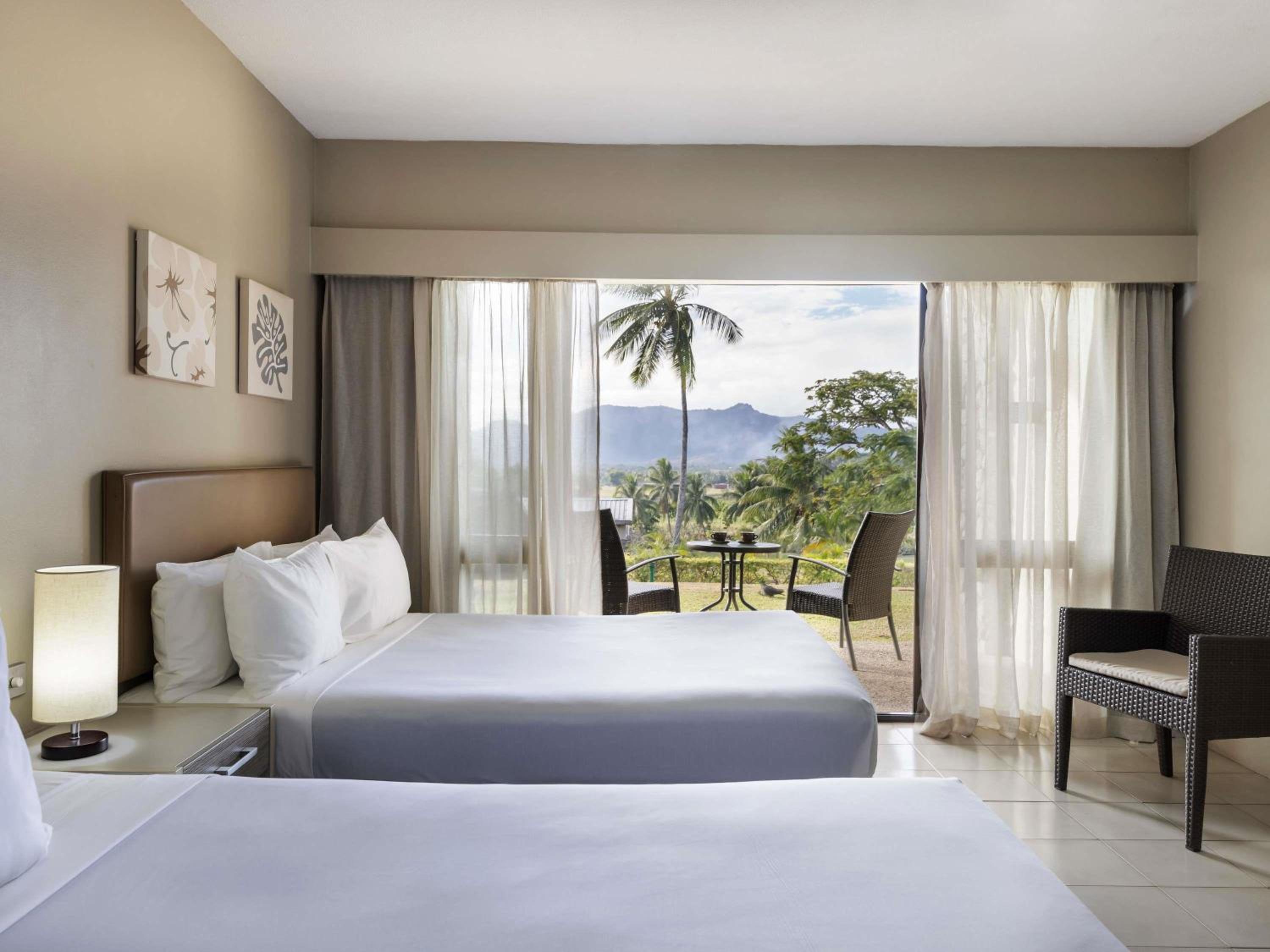 Standard Room with One Queen and One Single Bed photo 2