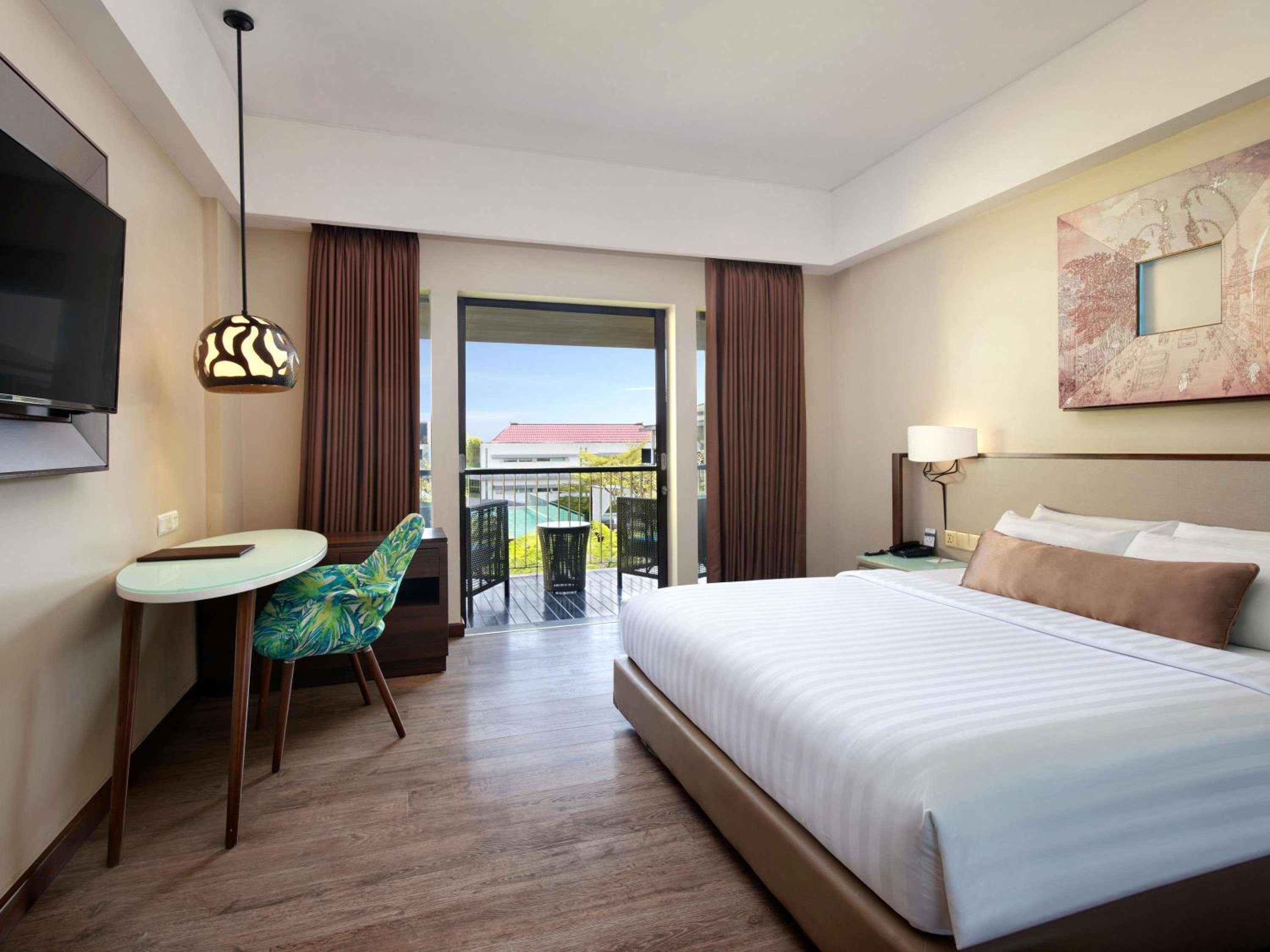 Deluxe Room with Balcony and Pool View