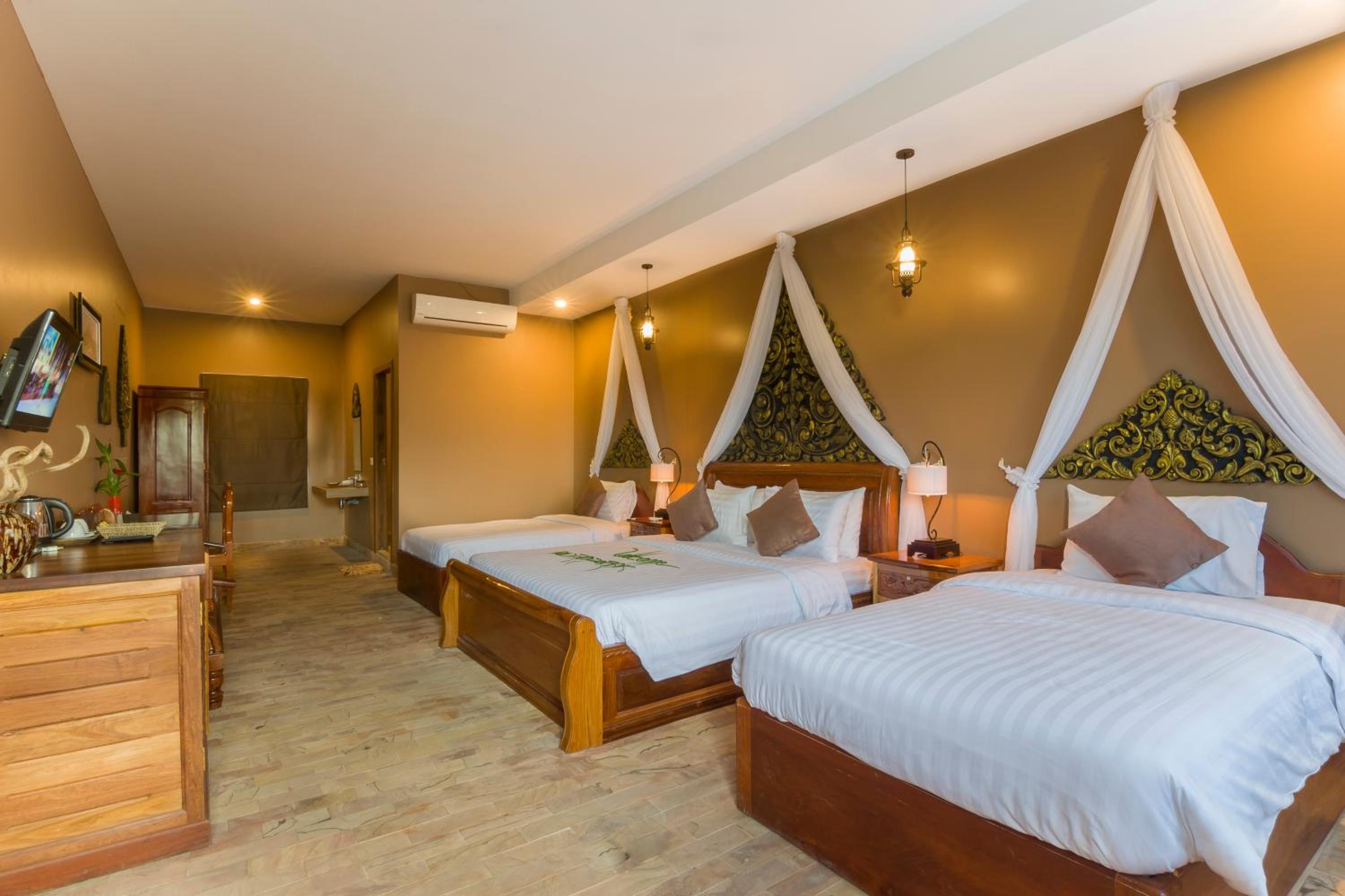 Deluxe Triple Room - Photo 16