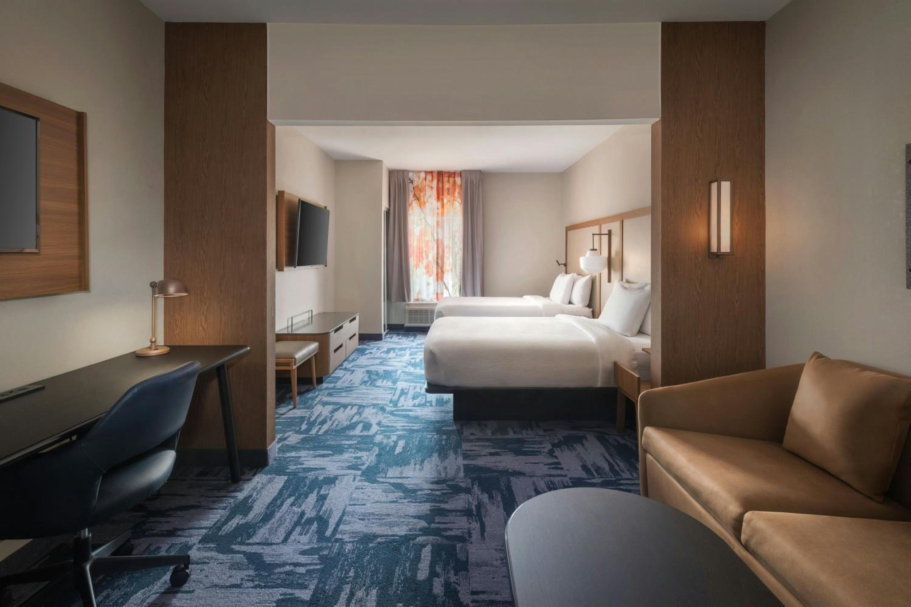 Queen Suite with Two Queen Beds and Sofa Bed - Photo 1