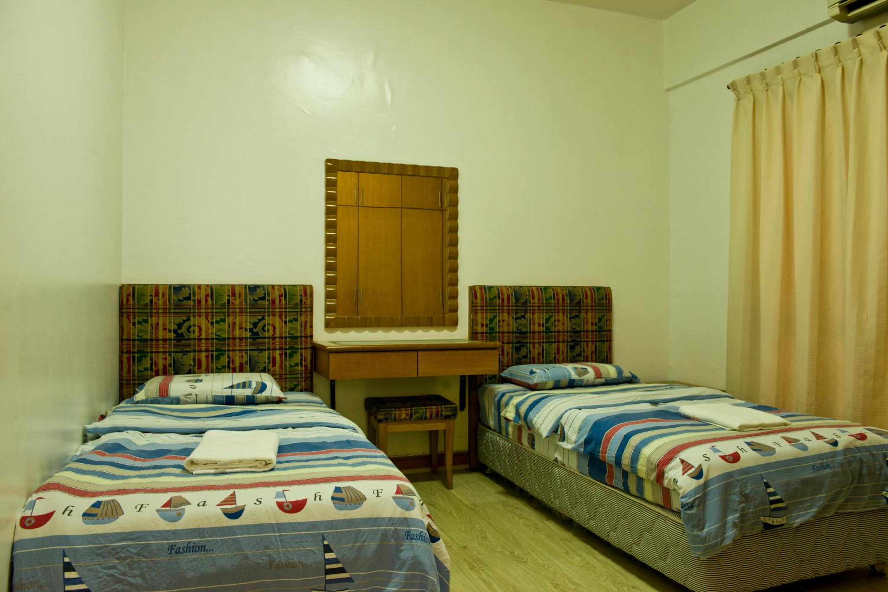 Three-Bedroom Apartment - Photo 45