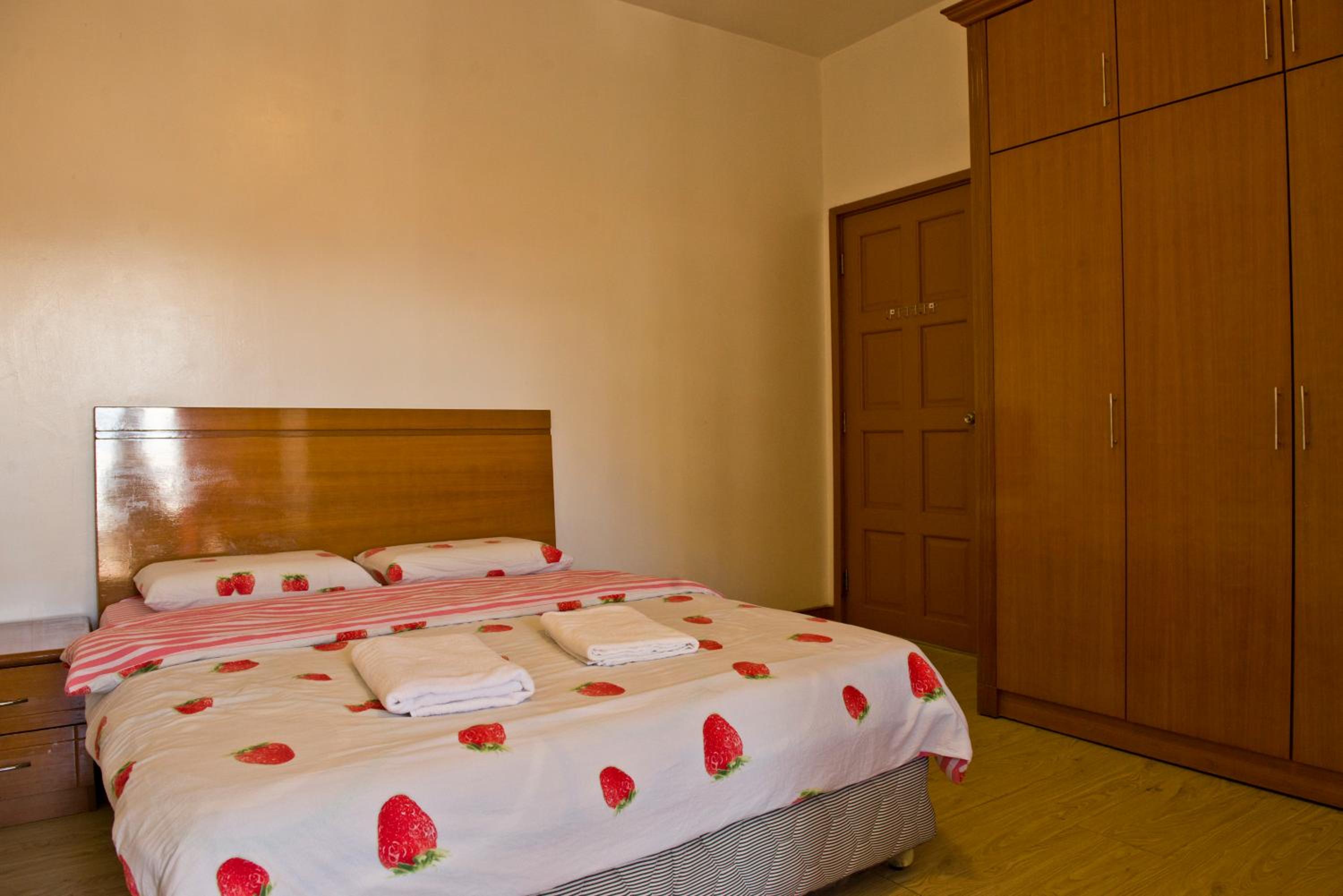 Three-Bedroom Apartment - Photo 46
