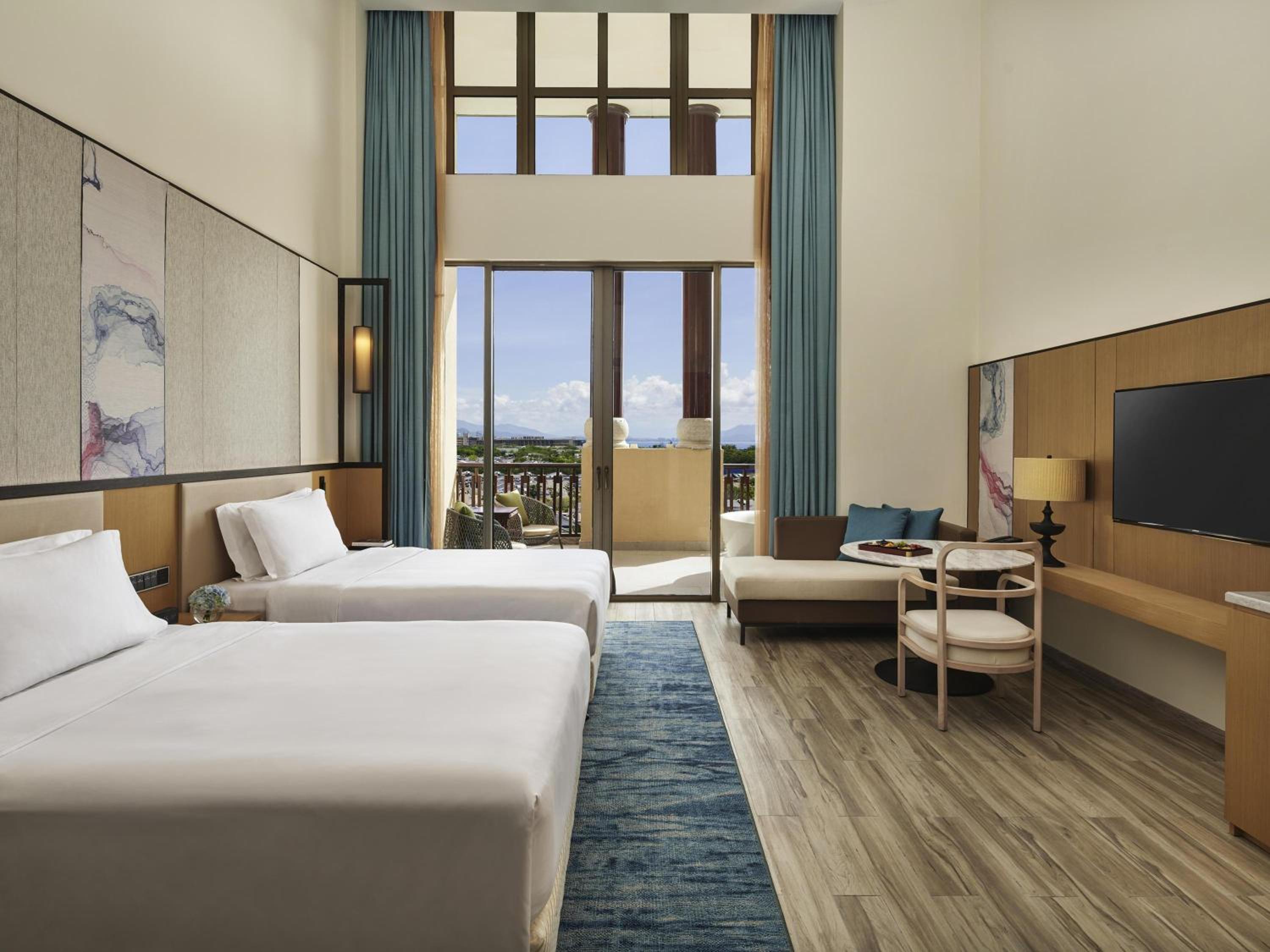 Family Suite with One King Bed and Two Single Beds - Sea View photo 2