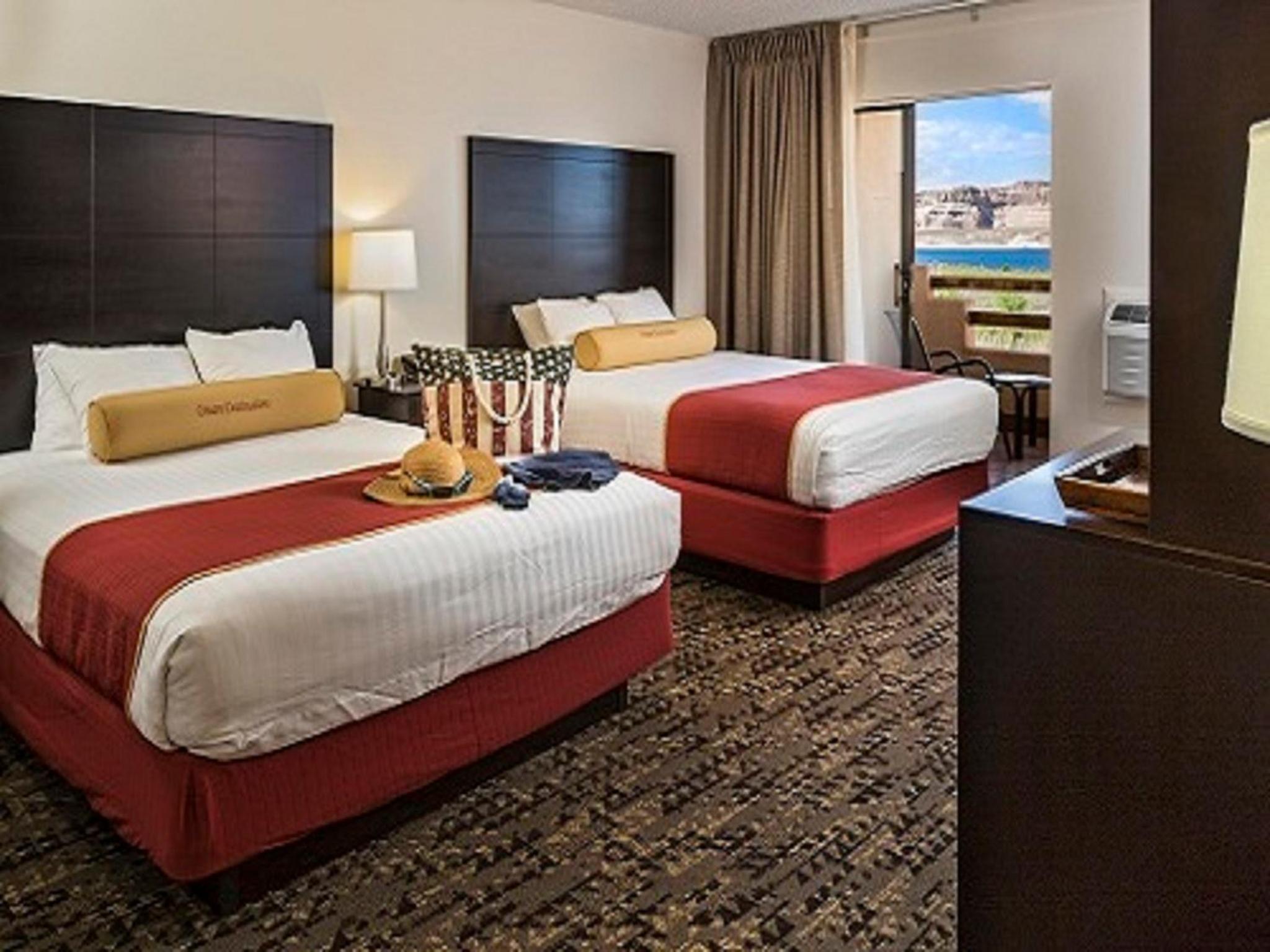 Queen Room with Two Queen Beds and Deluxe View - Photo 1