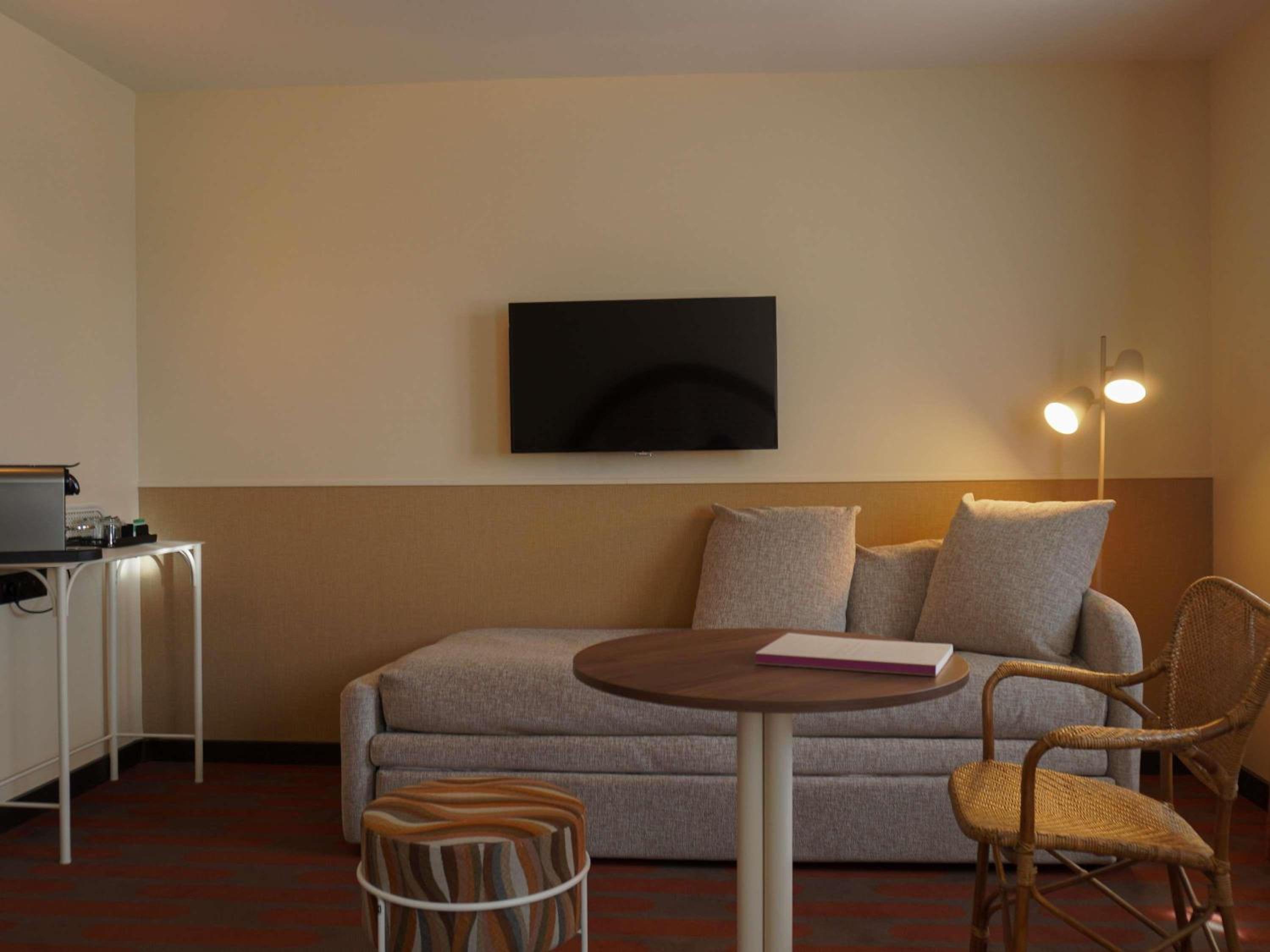 Privilege Triple Room with One Double and one Sofa Bed