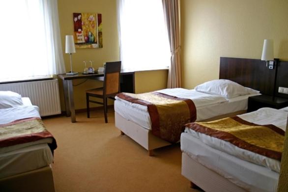 Triple Room - Photo 1