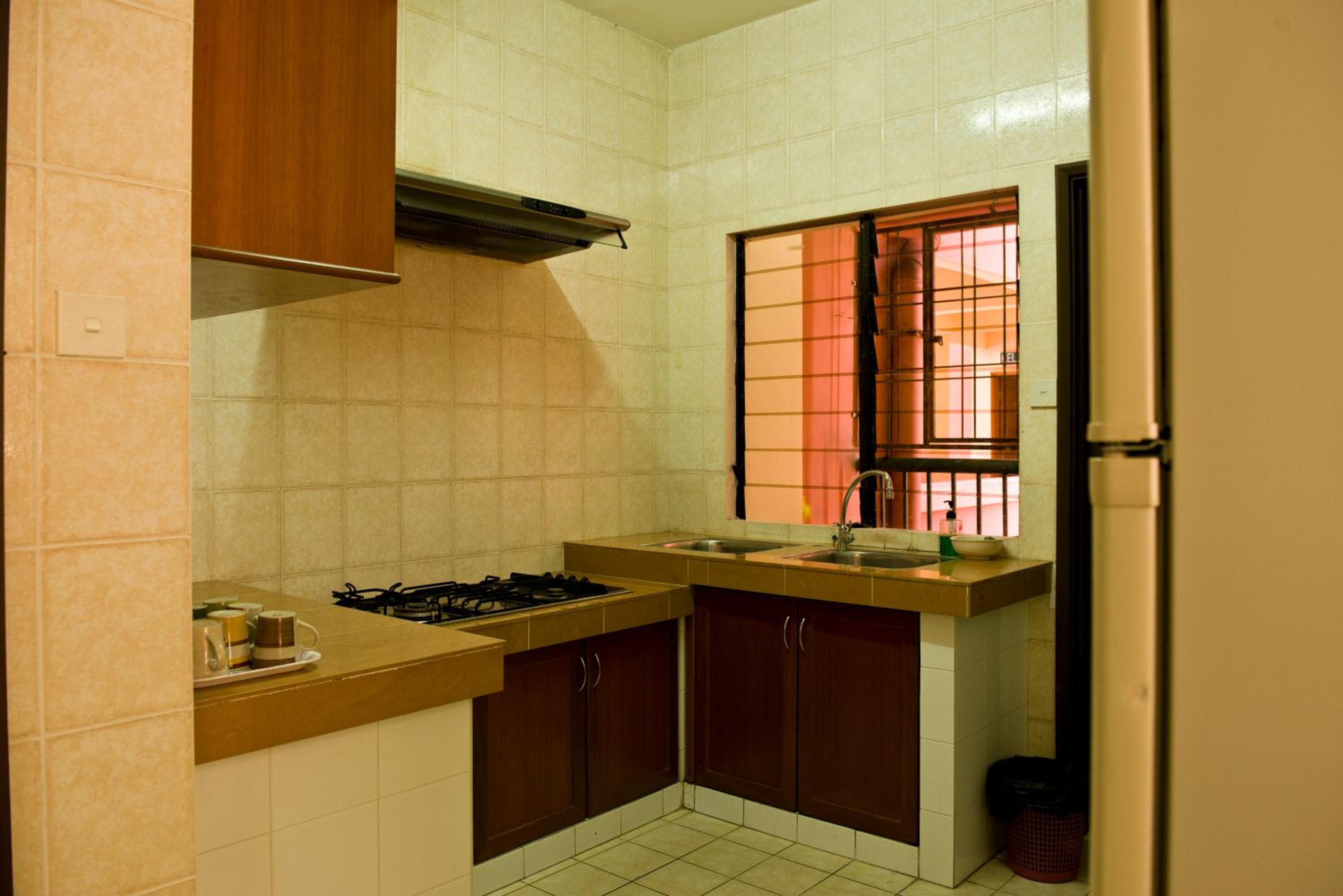 Three-Bedroom Apartment - Photo 32