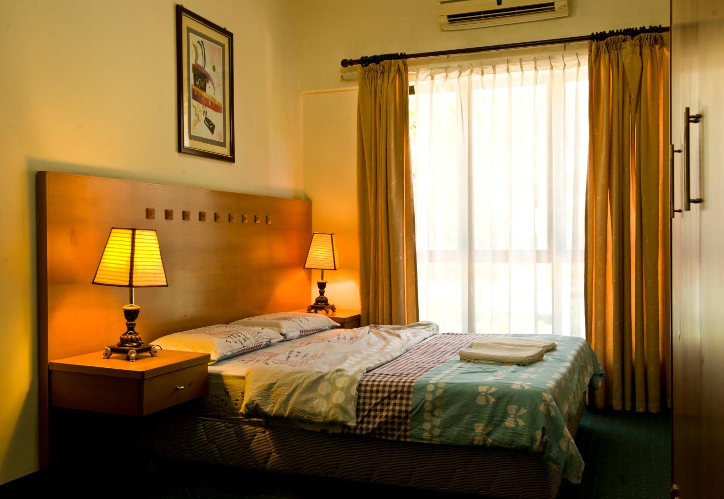 Three-Bedroom Apartment - Photo 43