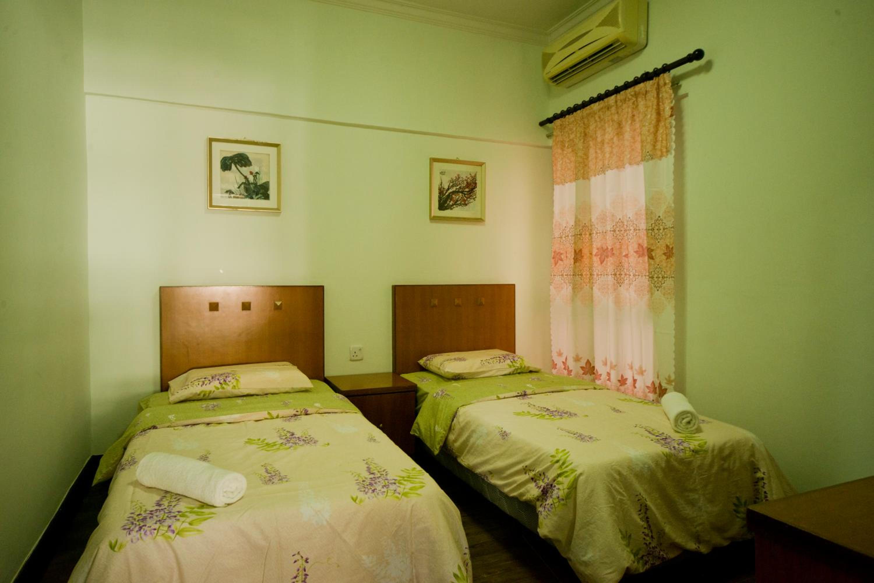 Three-Bedroom Apartment - Photo 41