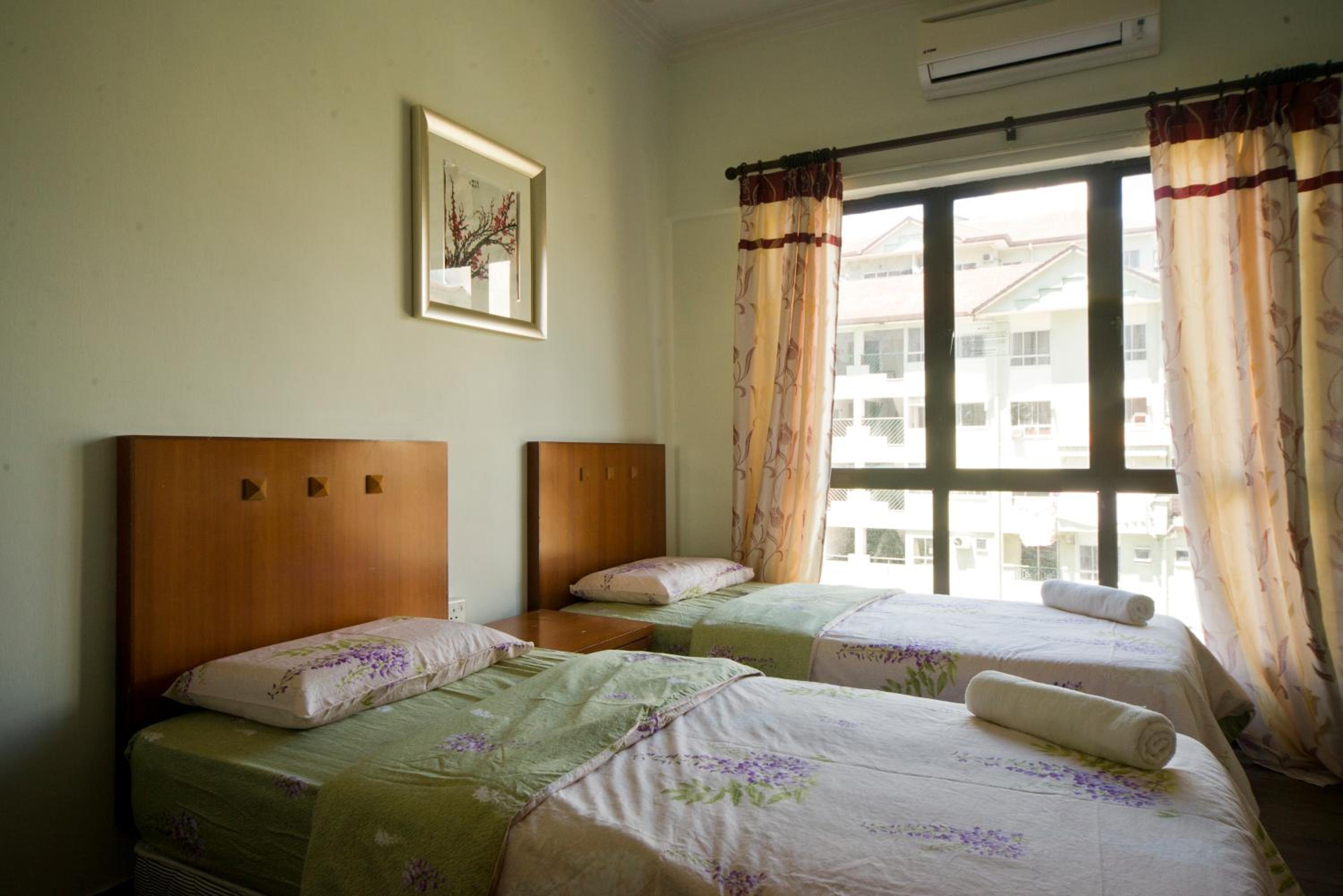 Three-Bedroom Apartment - Photo 40