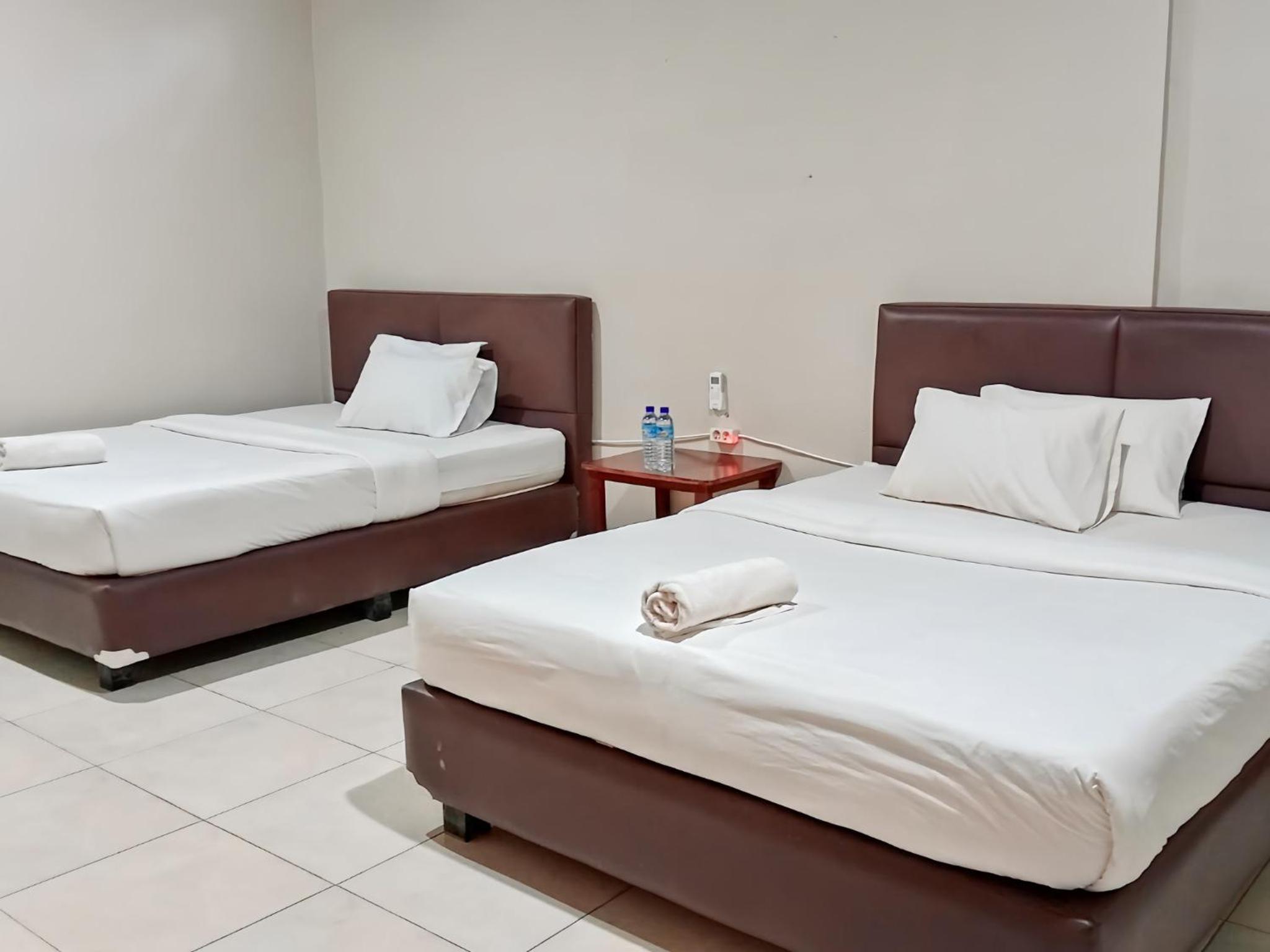Superior Queen Room with Two Queen Beds - Photo 1