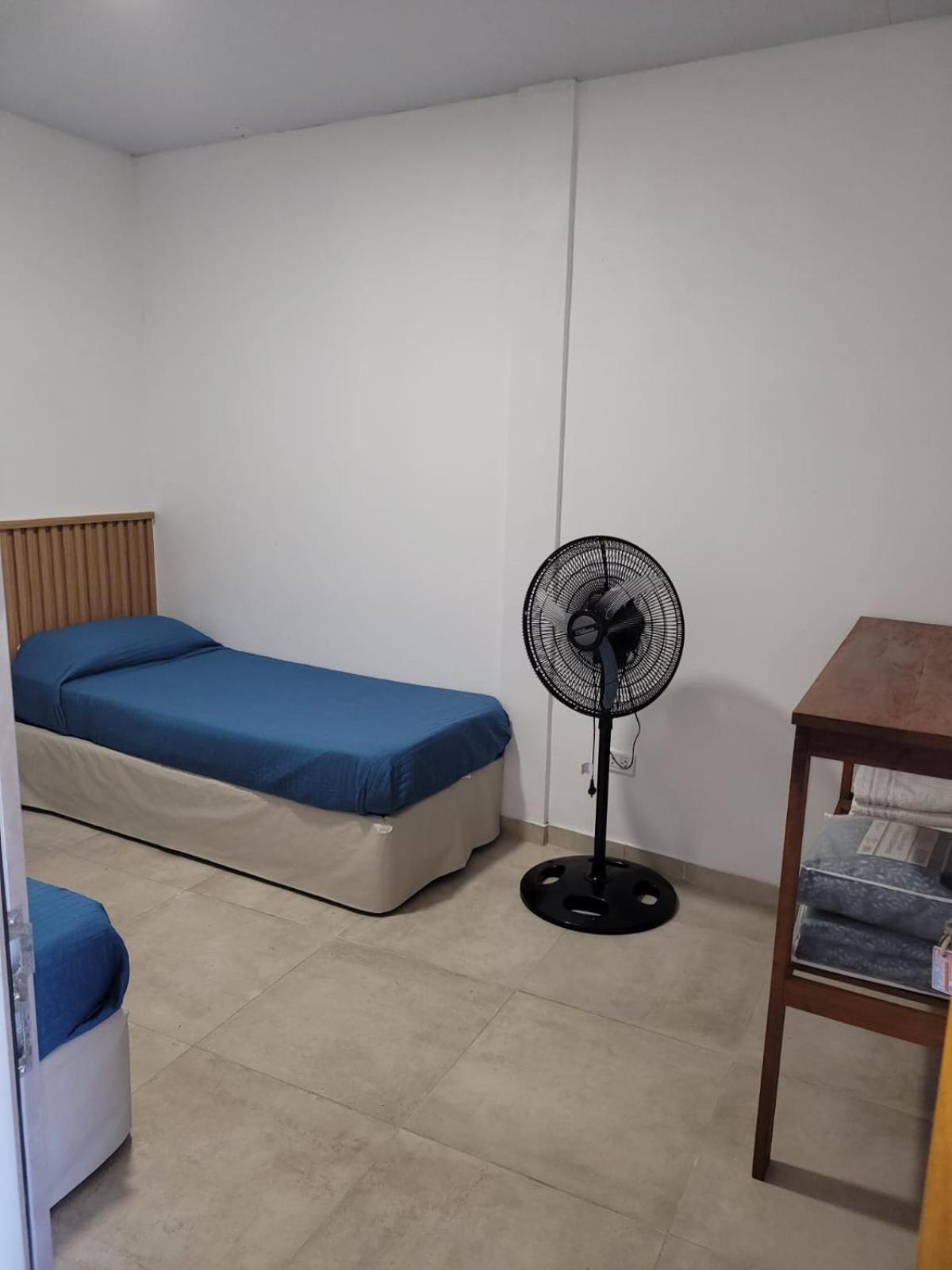 One-Bedroom Apartment with Balcony and City View photo 2