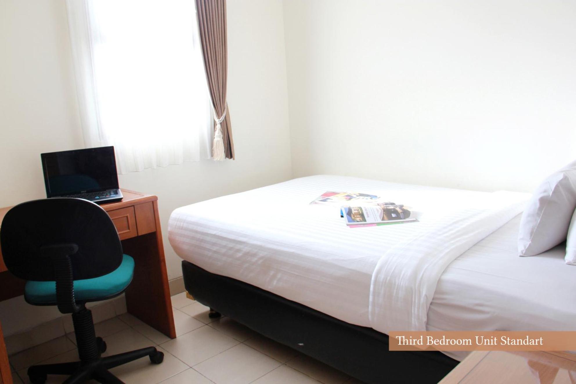 Three-Bedroom Suite - Photo 6