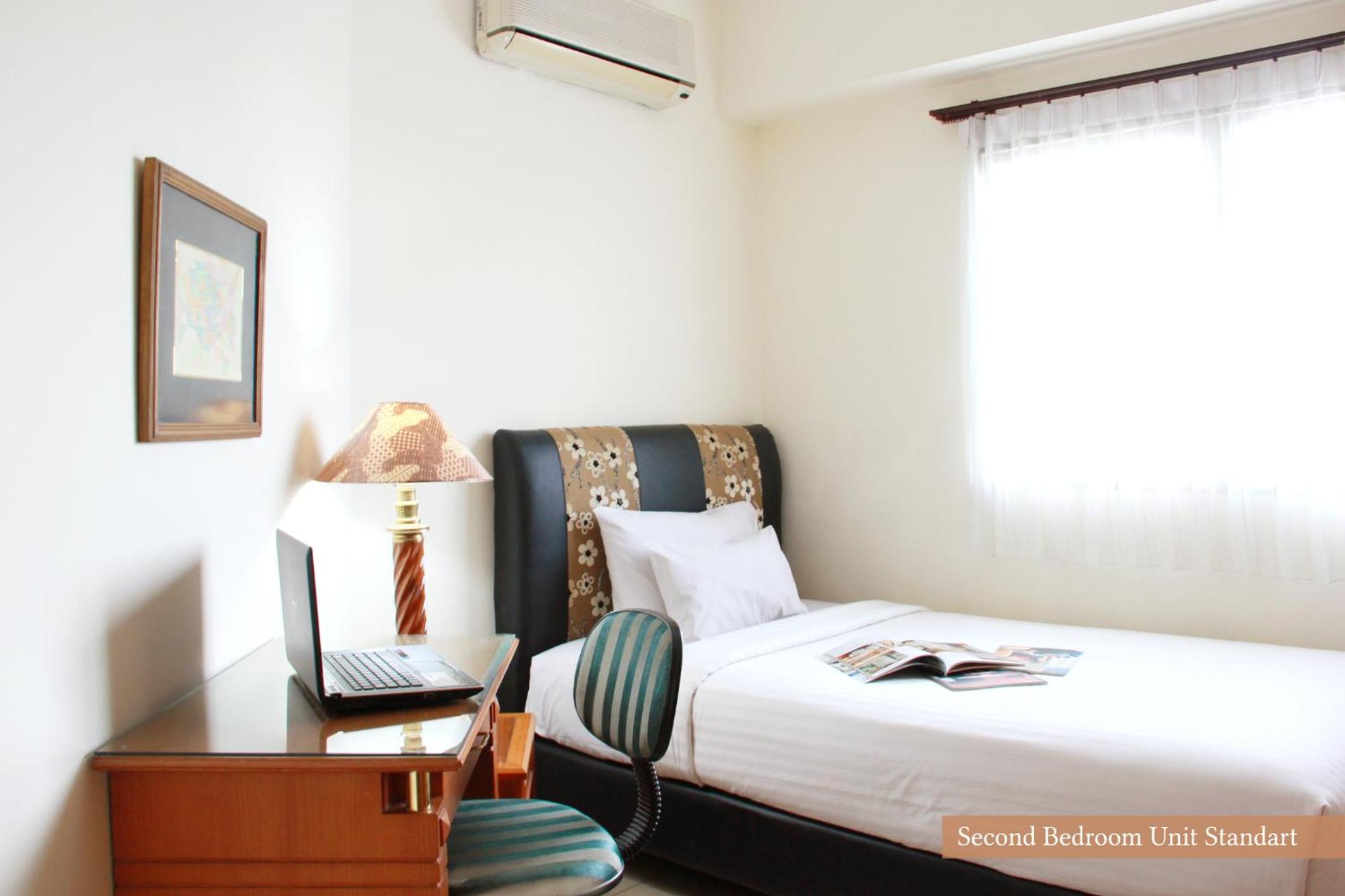 Three-Bedroom Suite - Photo 8